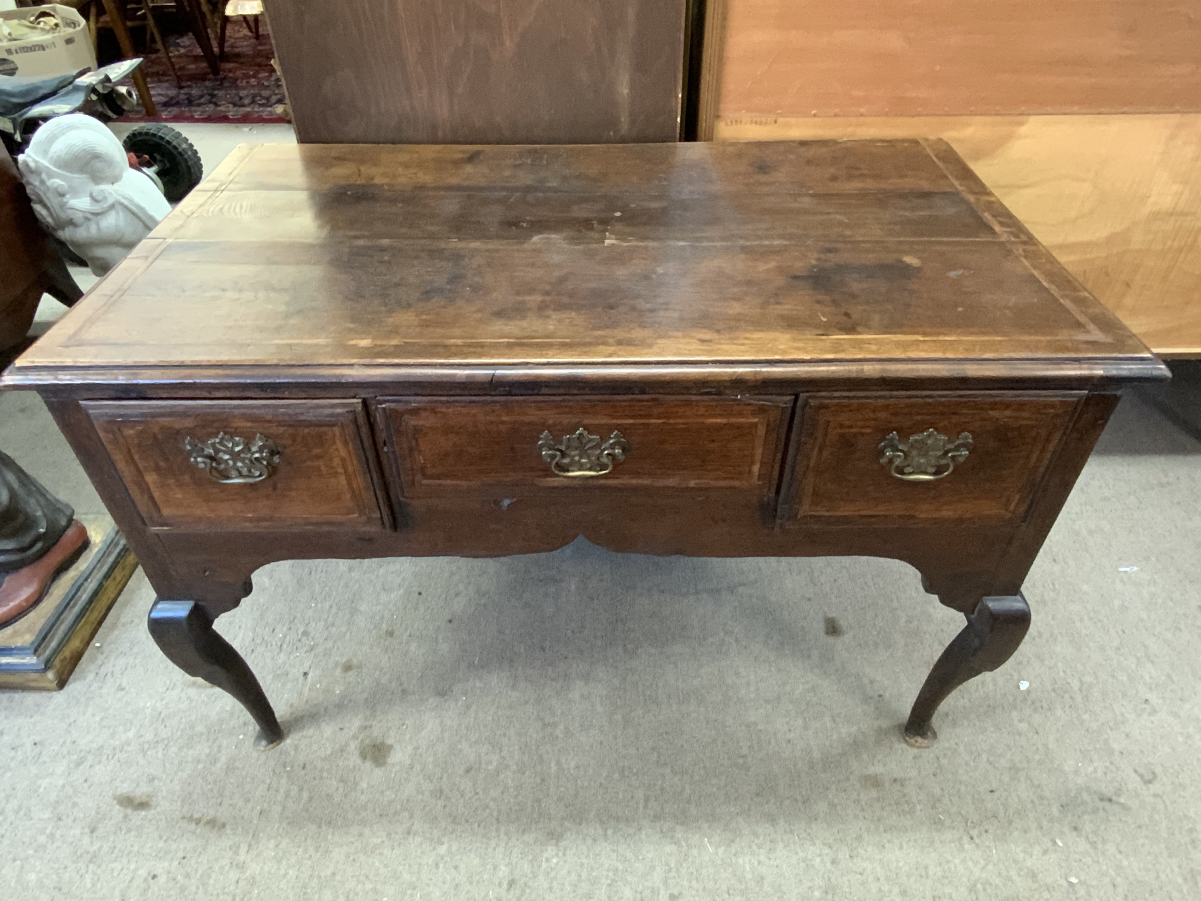 An 18th Century oak lowboy with 3 drawers. 98cm x 60cm x 69cm.