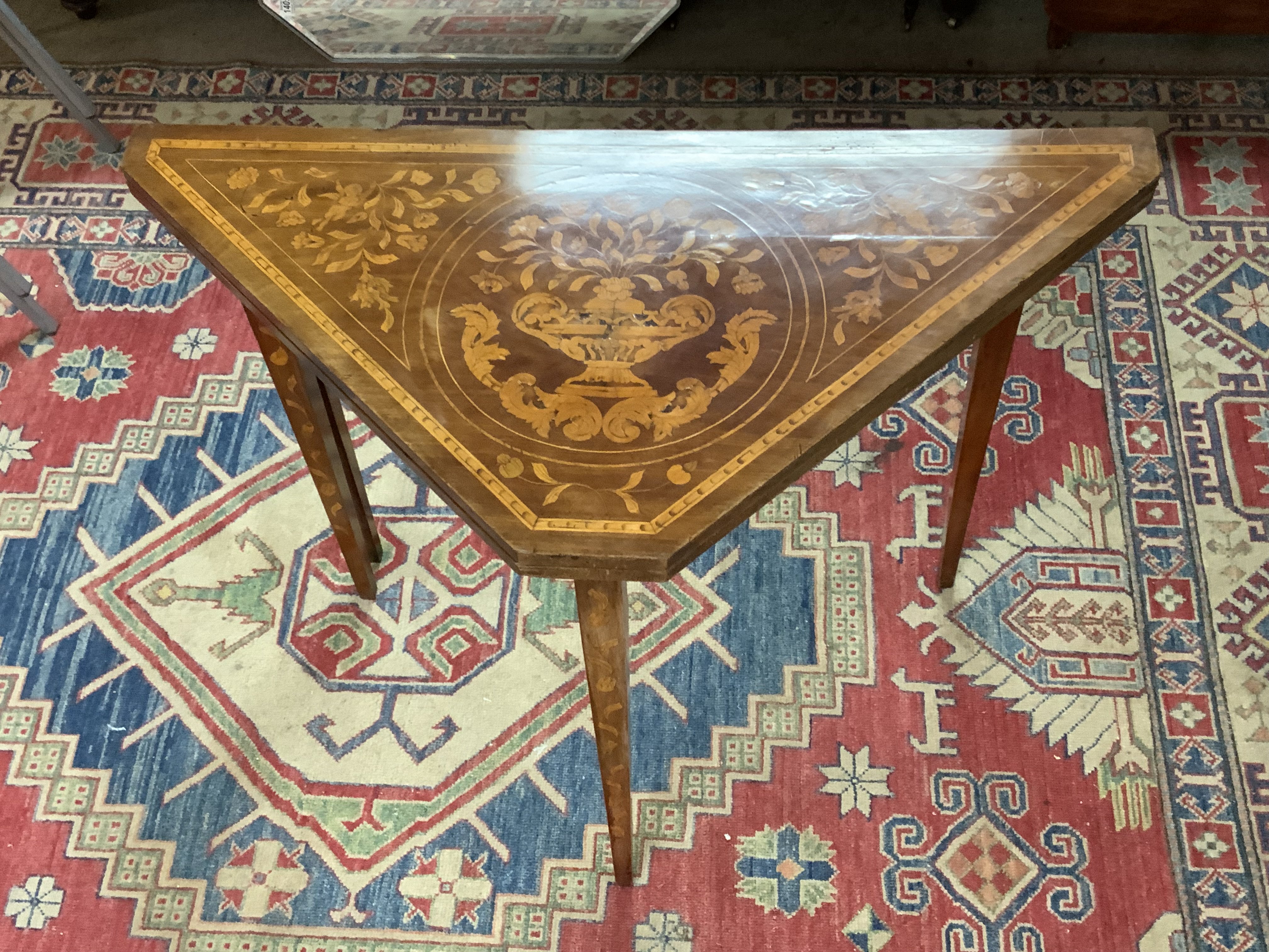 A 19th century mahogany and Dutch marquetry envelope card table.