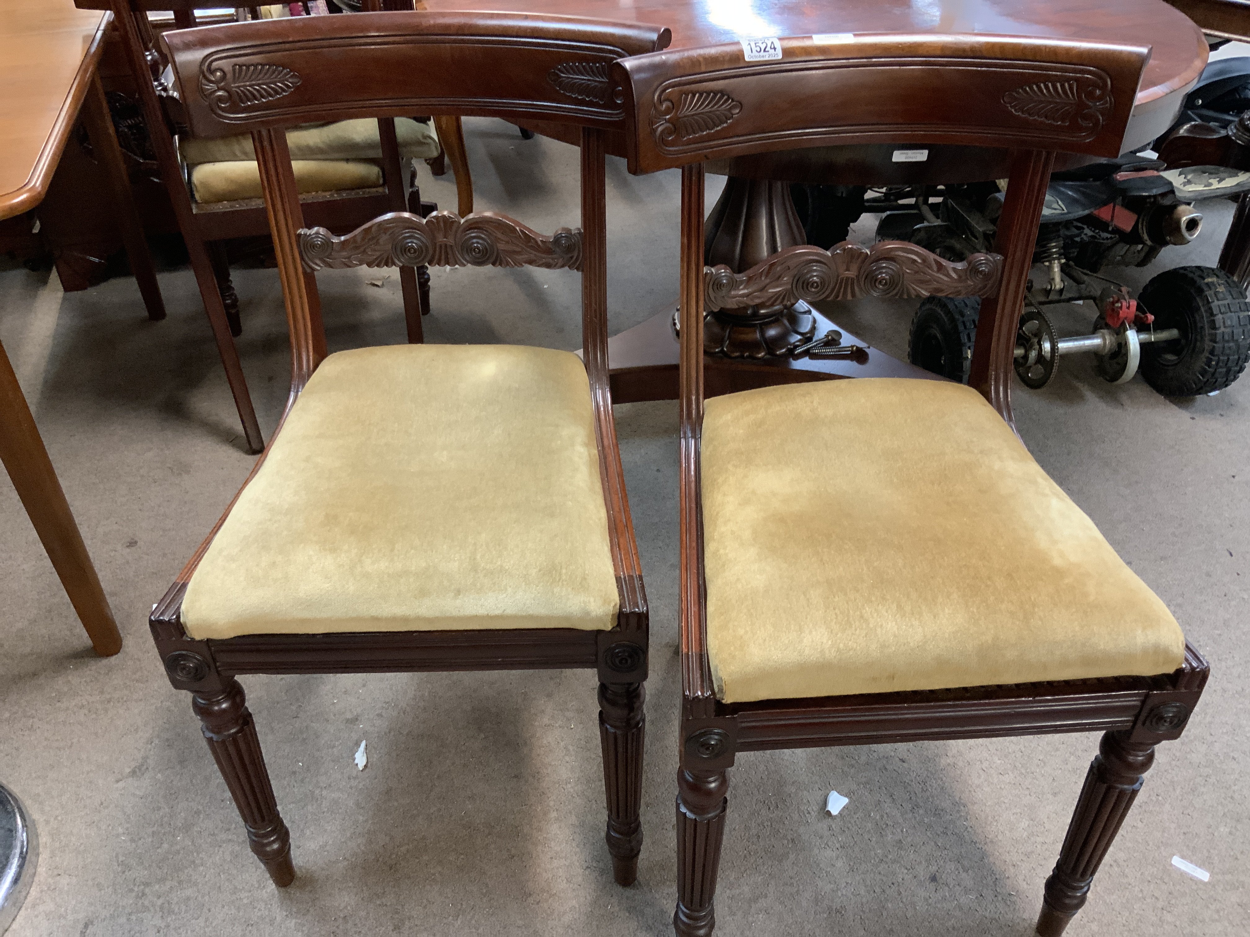 A set of 4 regency mahogany dining chairs.