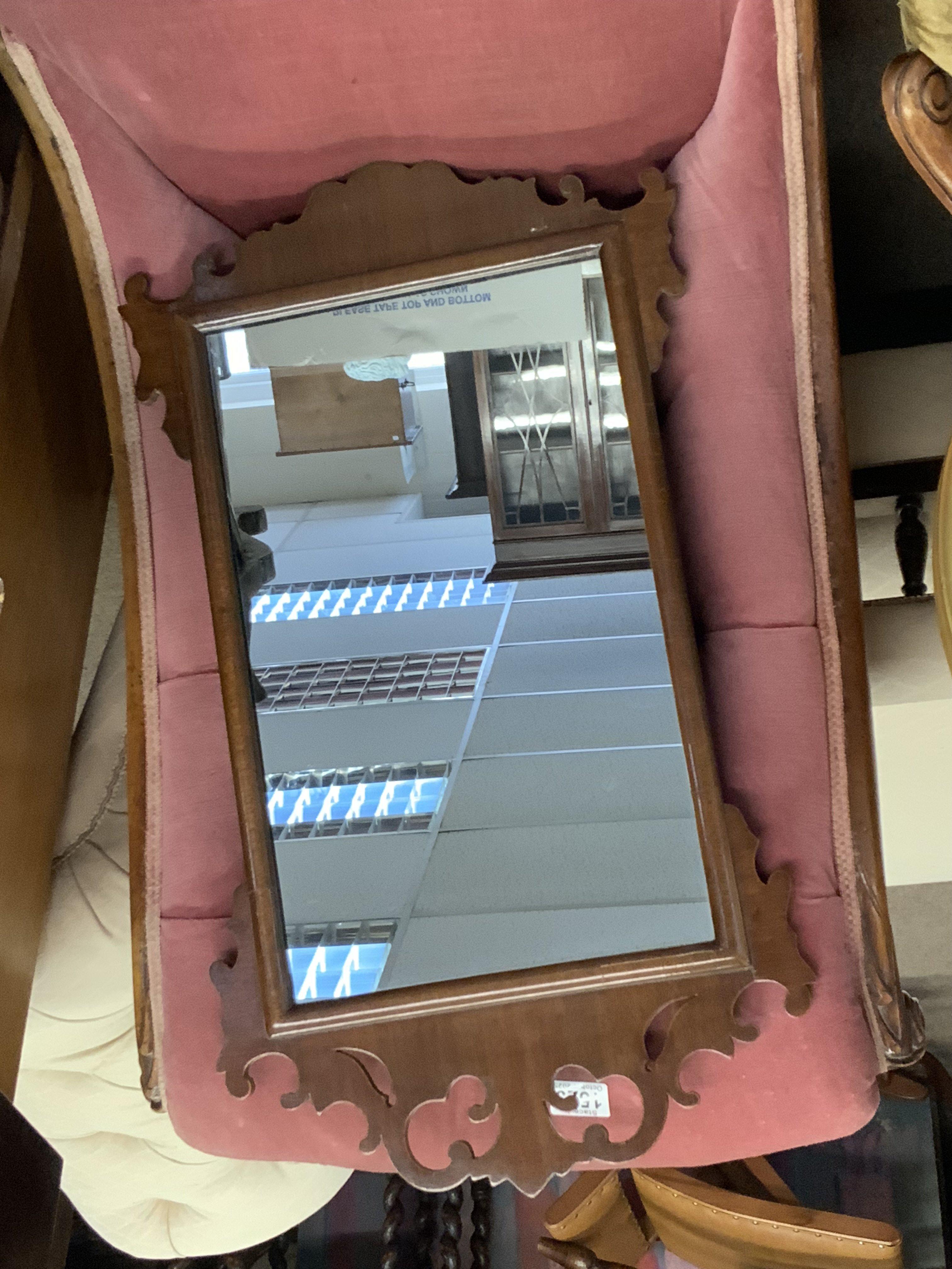 A gilt framed convex wall mirror together with a regency mahogany veneered wall mirror.