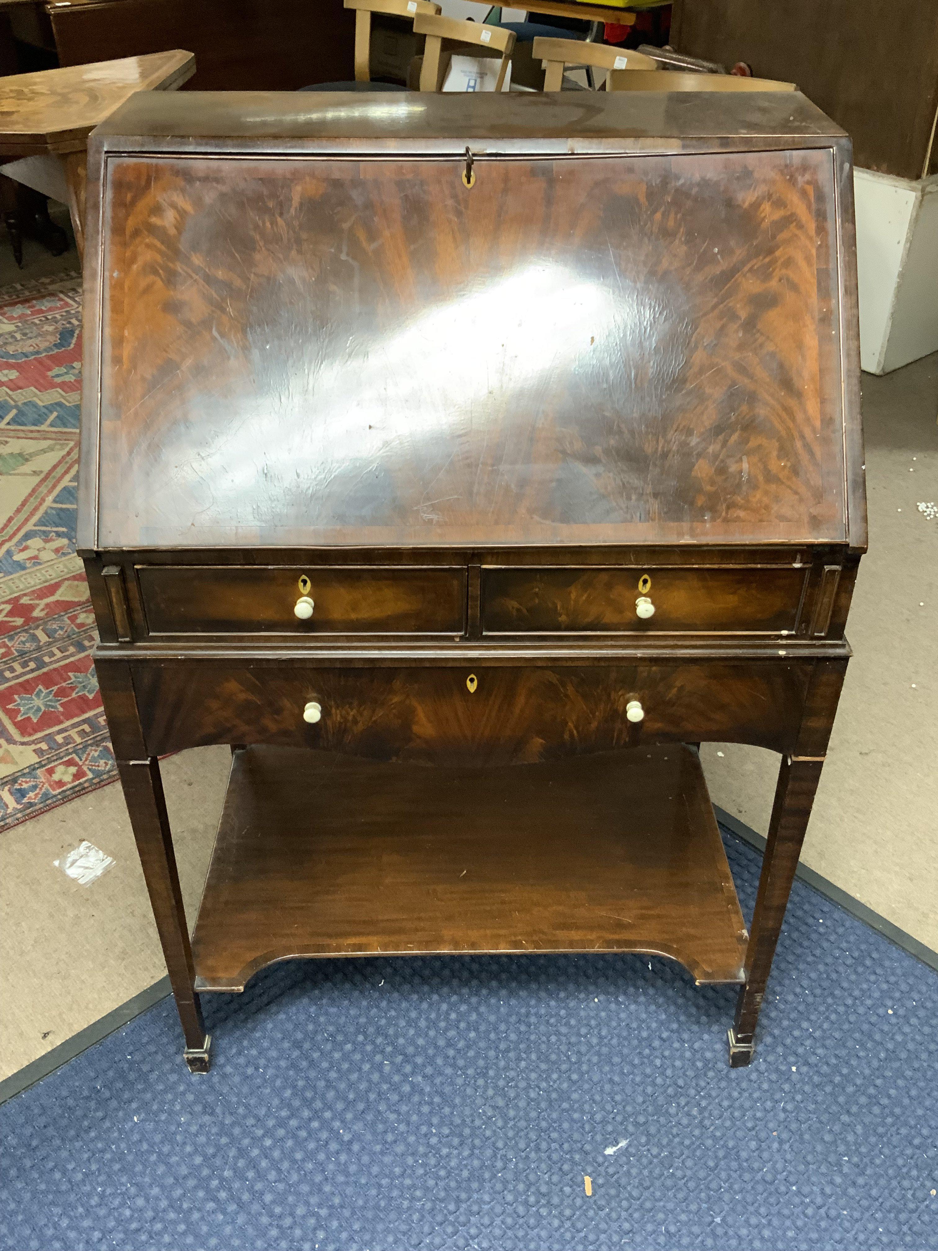 A small 1930s mahogany drop front Bureau. In need of some restoration.