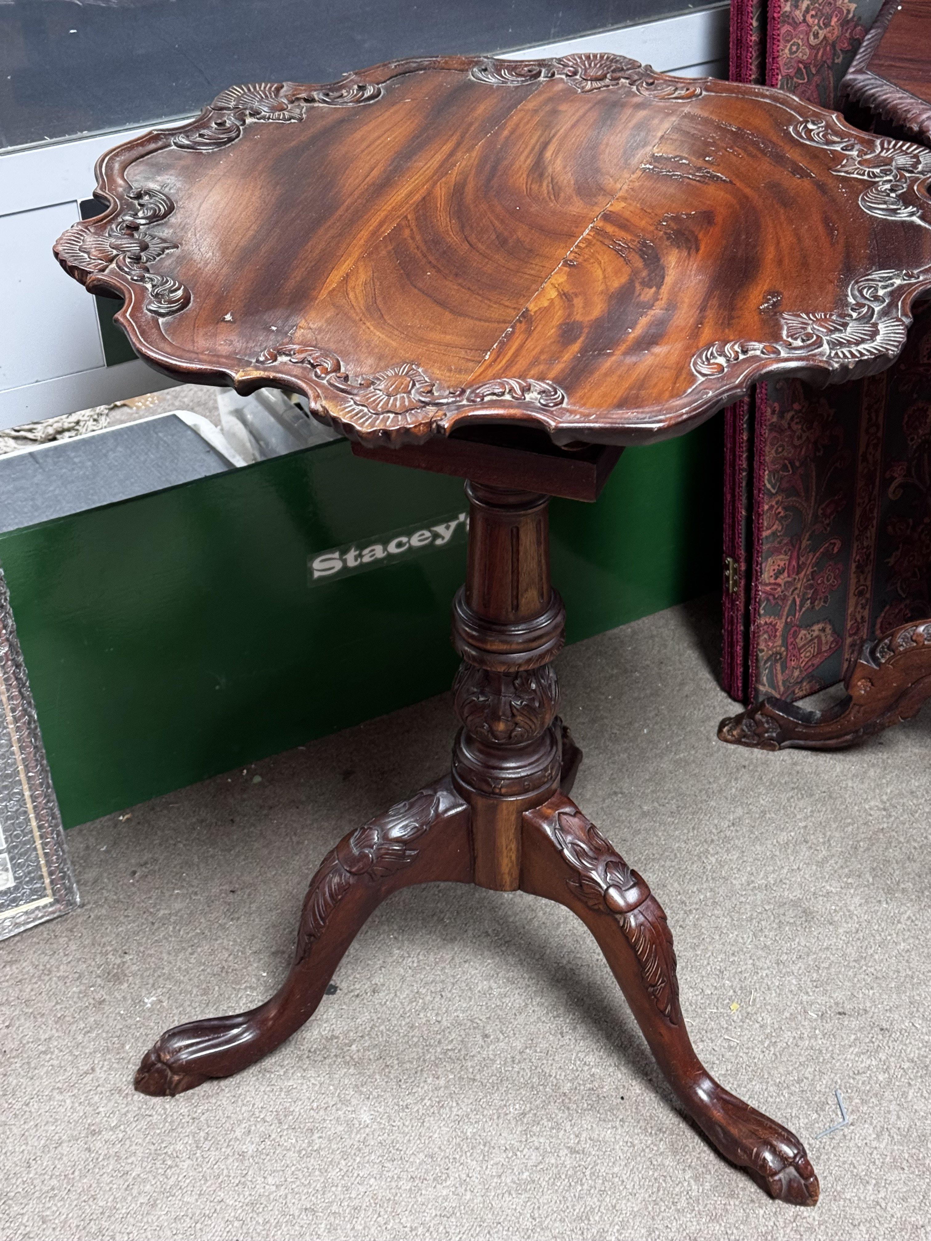 A Mahogany Tilt-top "birdcage" tripod table, in the George III style