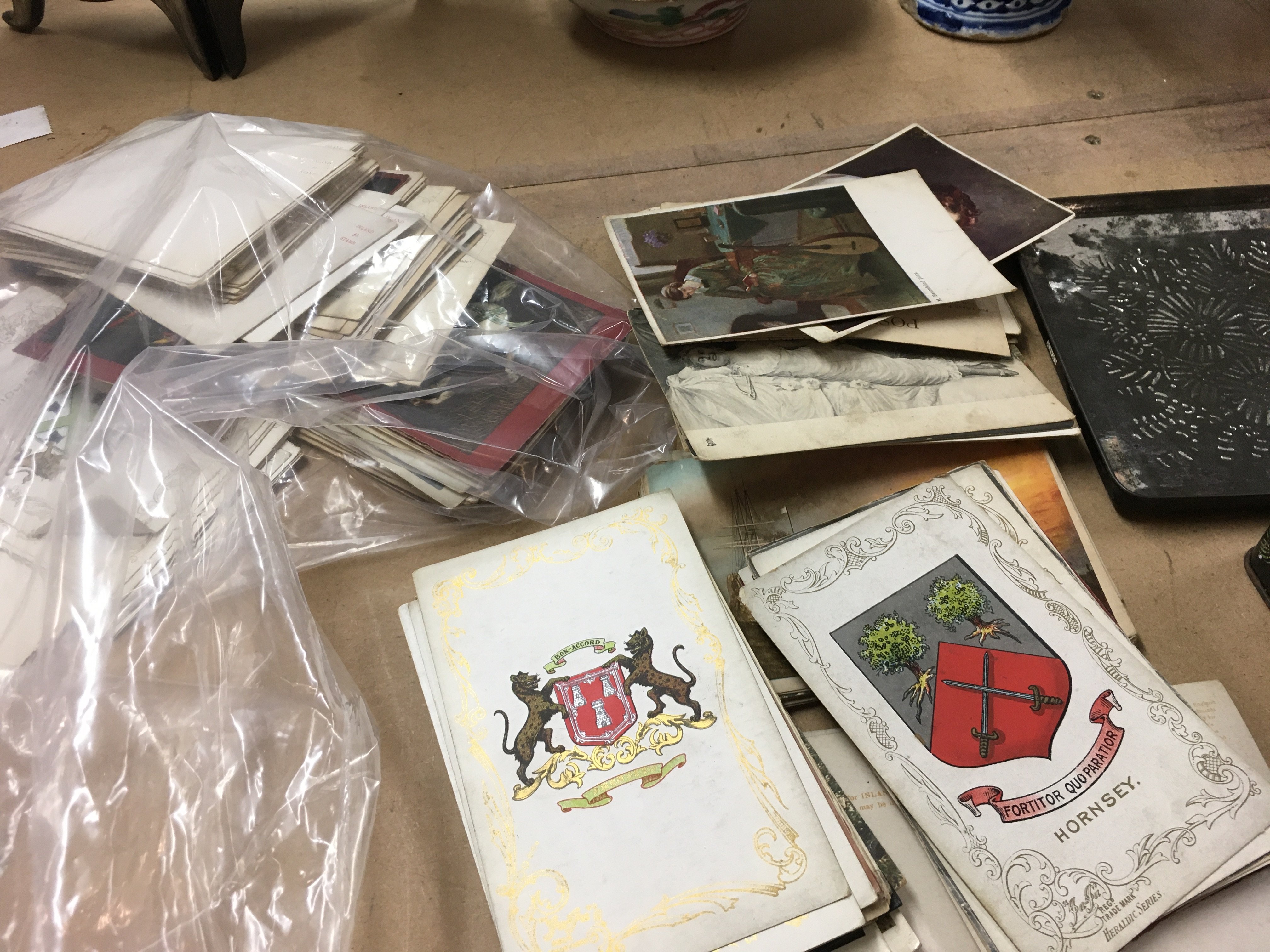 A collection of post cards and a collection of cigarettes .- NO RESERVE