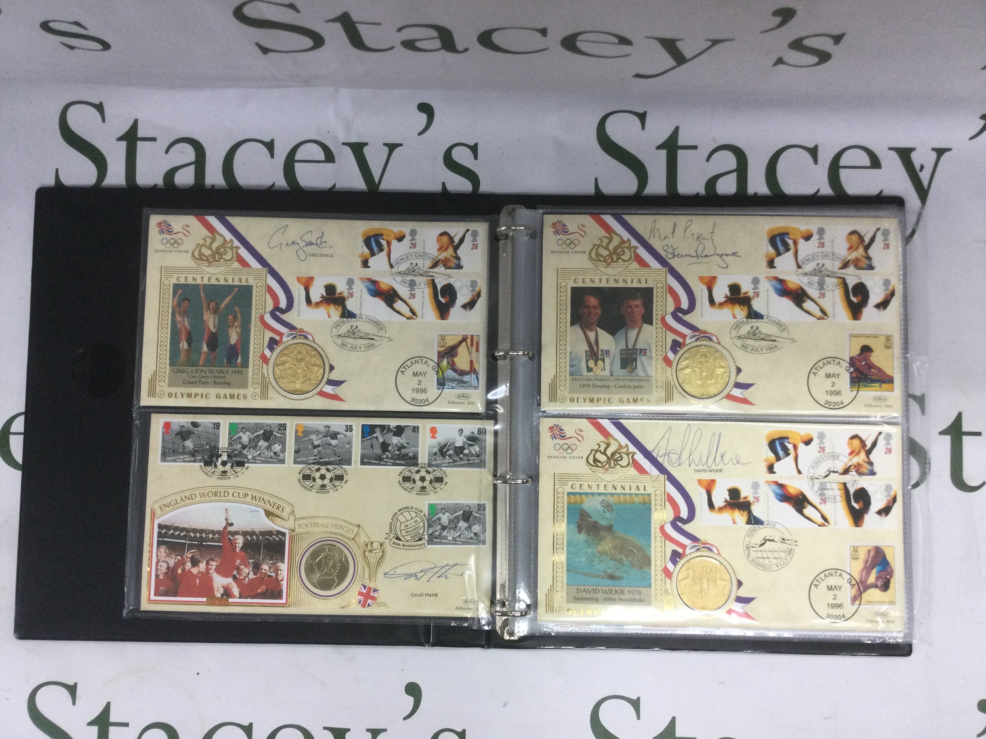 A binder of Olympic and sporting first day covers and coin covers, some signed. Shipping category B.