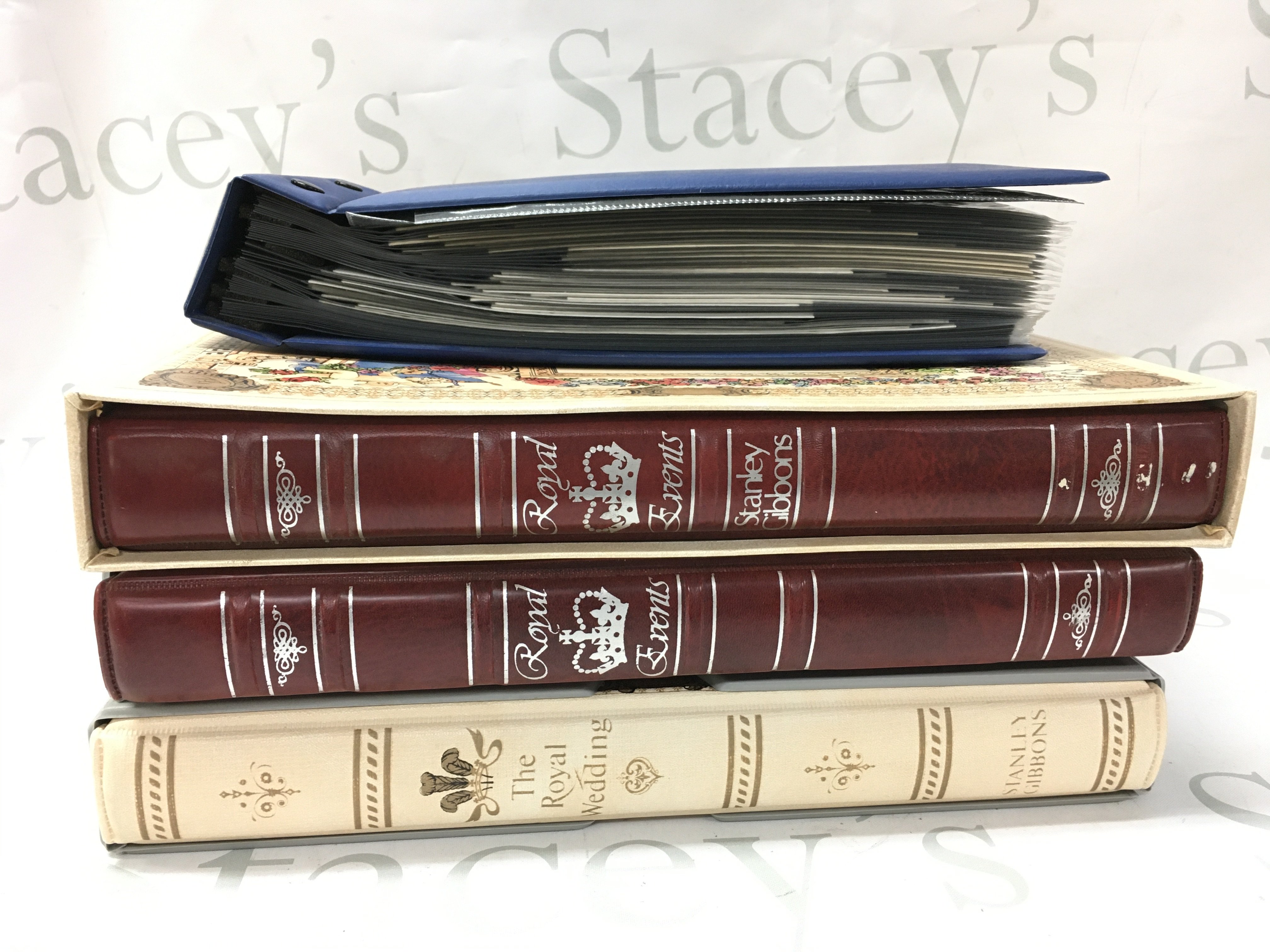 Three albums of unused Royal commonwealth stamps ,FA cup first day covers ,1966 World Cup first day cover .