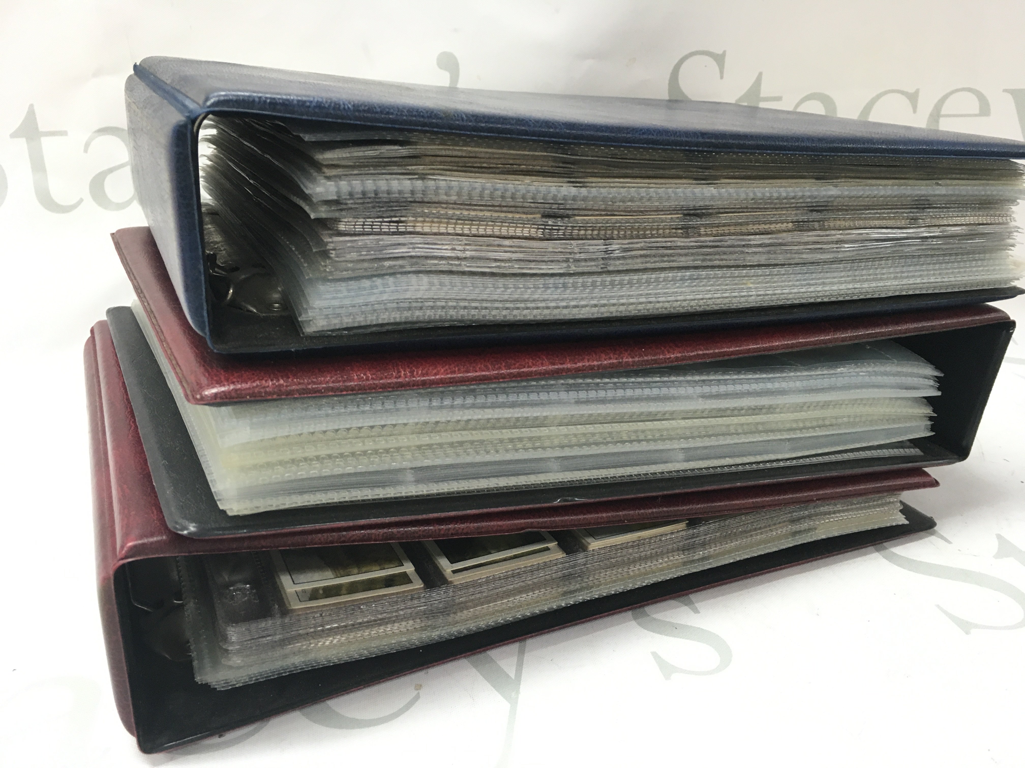 Three albums of cigarette card sets and early odds. Postage category B