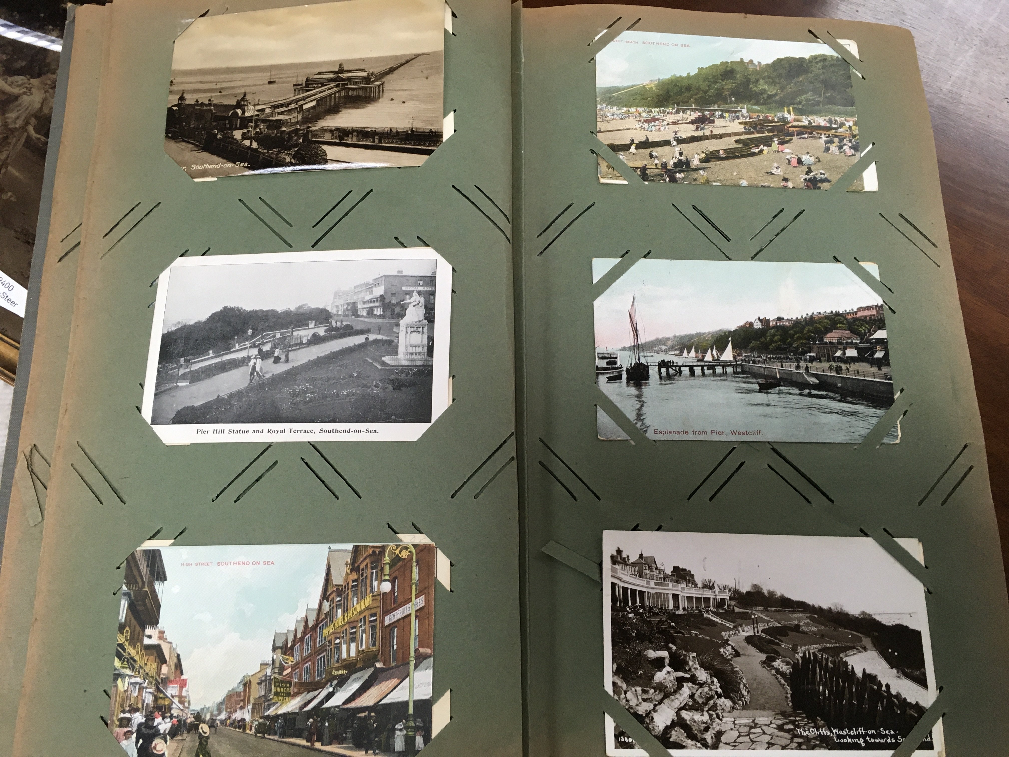Two postcard albums including Southend-on-sea views