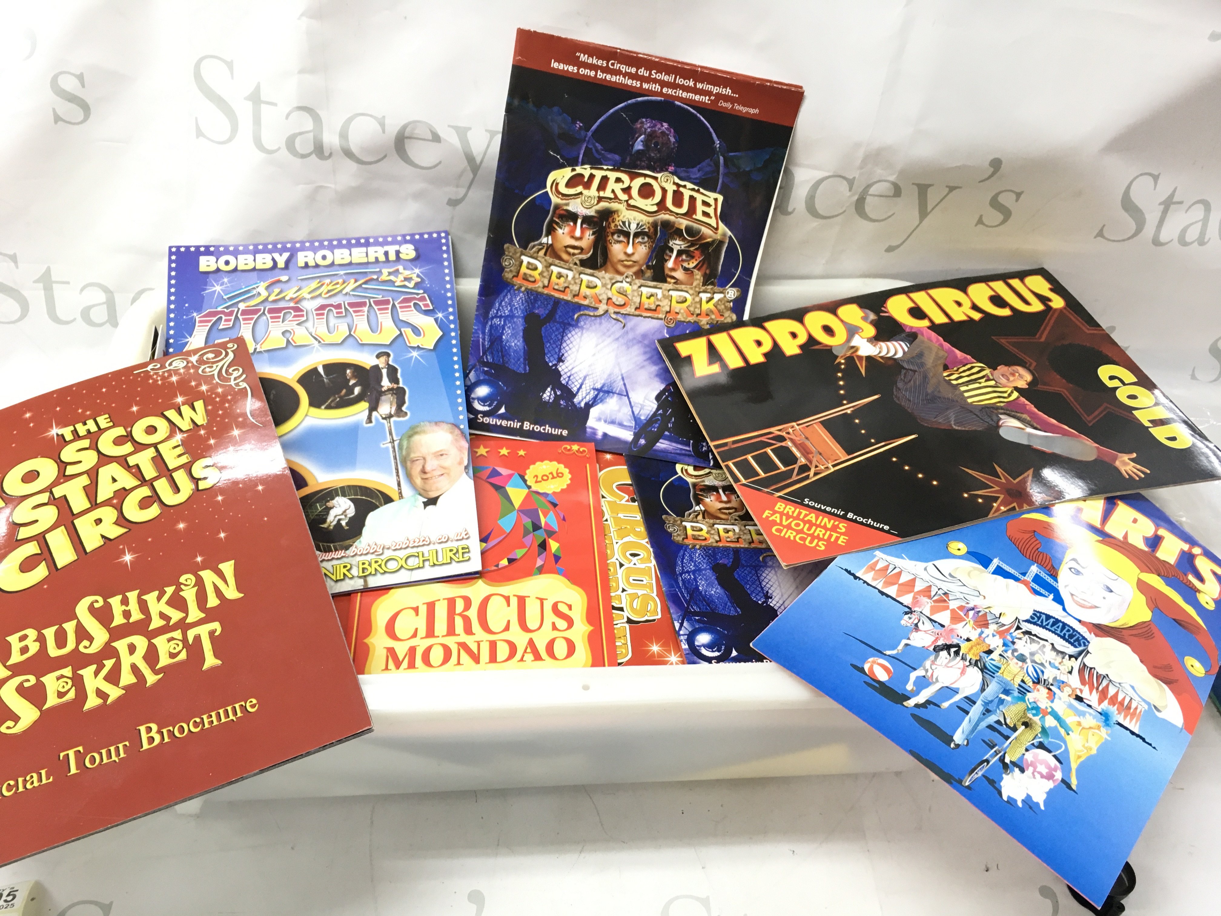 A box of circus programmes, including examples from circus Mondao, Billy smarts, the Moscow state circus, circus wonderland and various others.