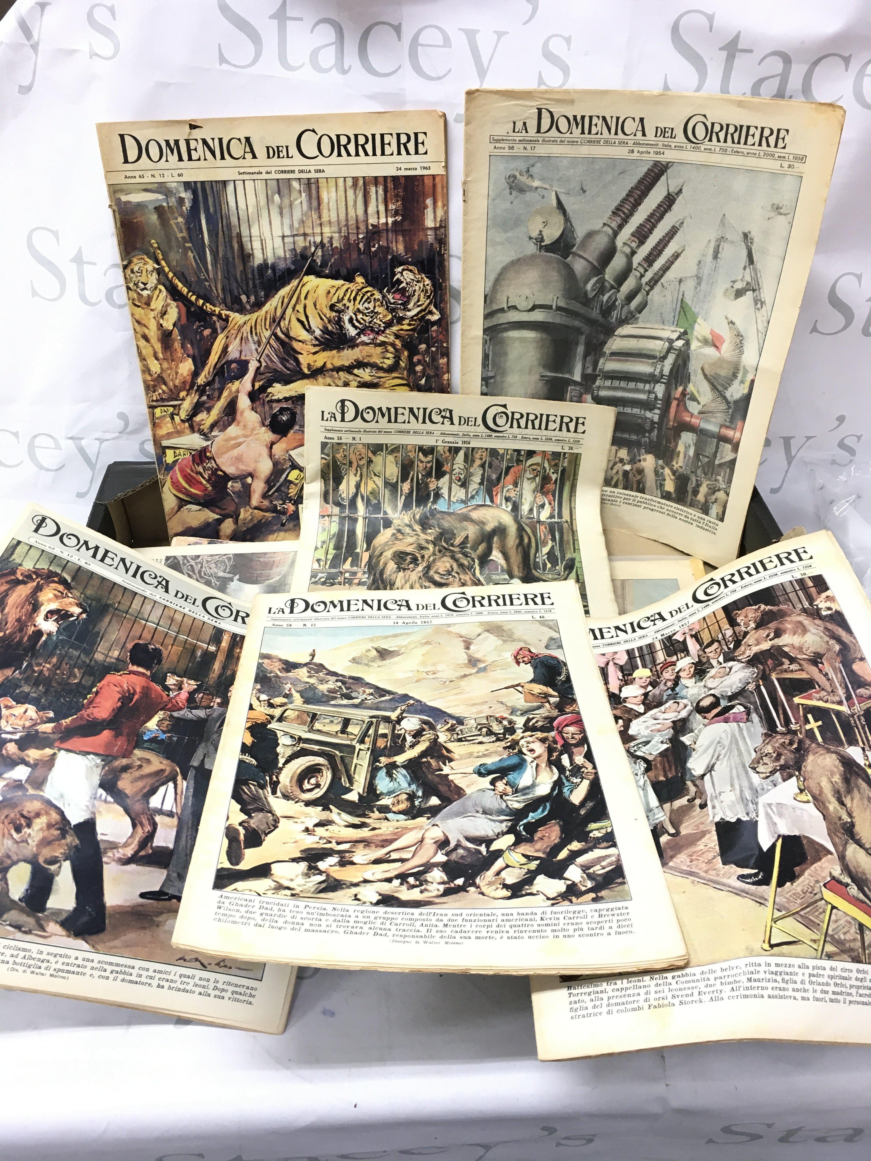 A box of Domenica del Corriere paper magazines from the 1950s-1960s.
