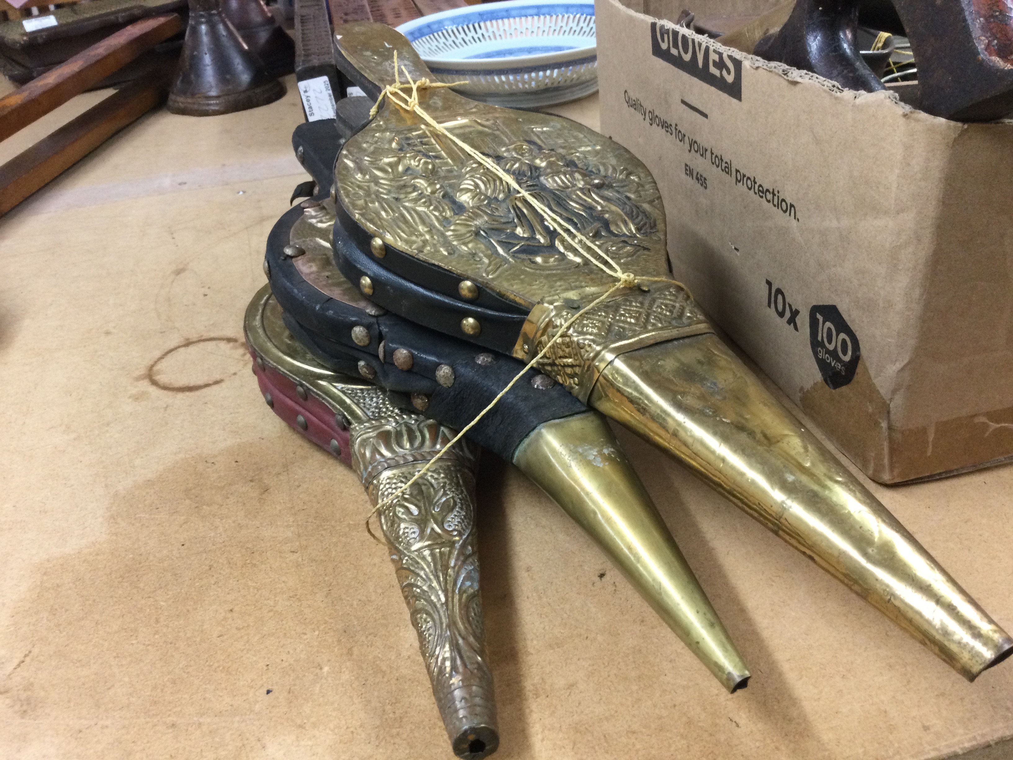 Three brass covered sets of bellows . Postage catC