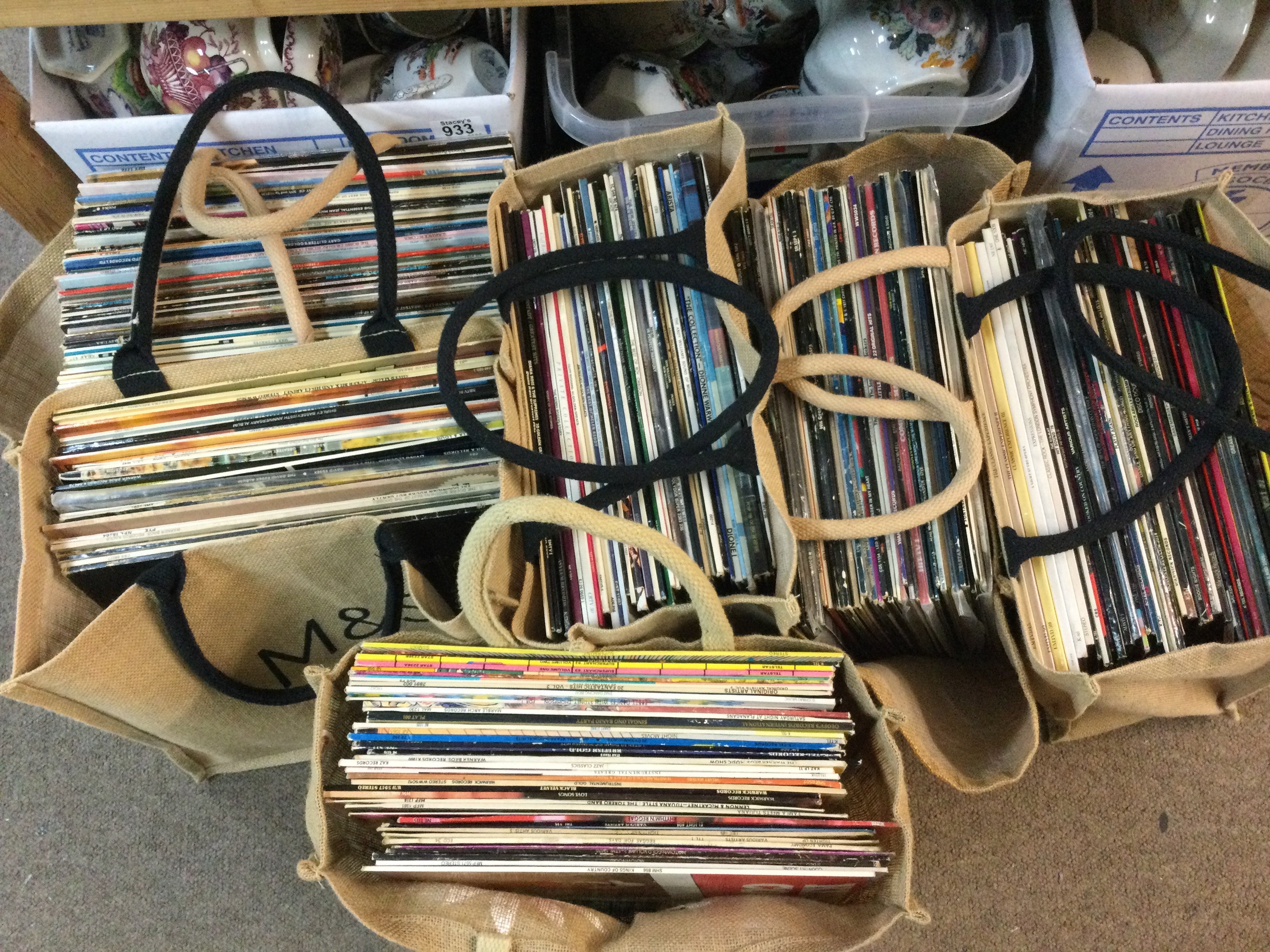 A collection of vinyl records including Madness, The Seekers, Elvis, compilations etc