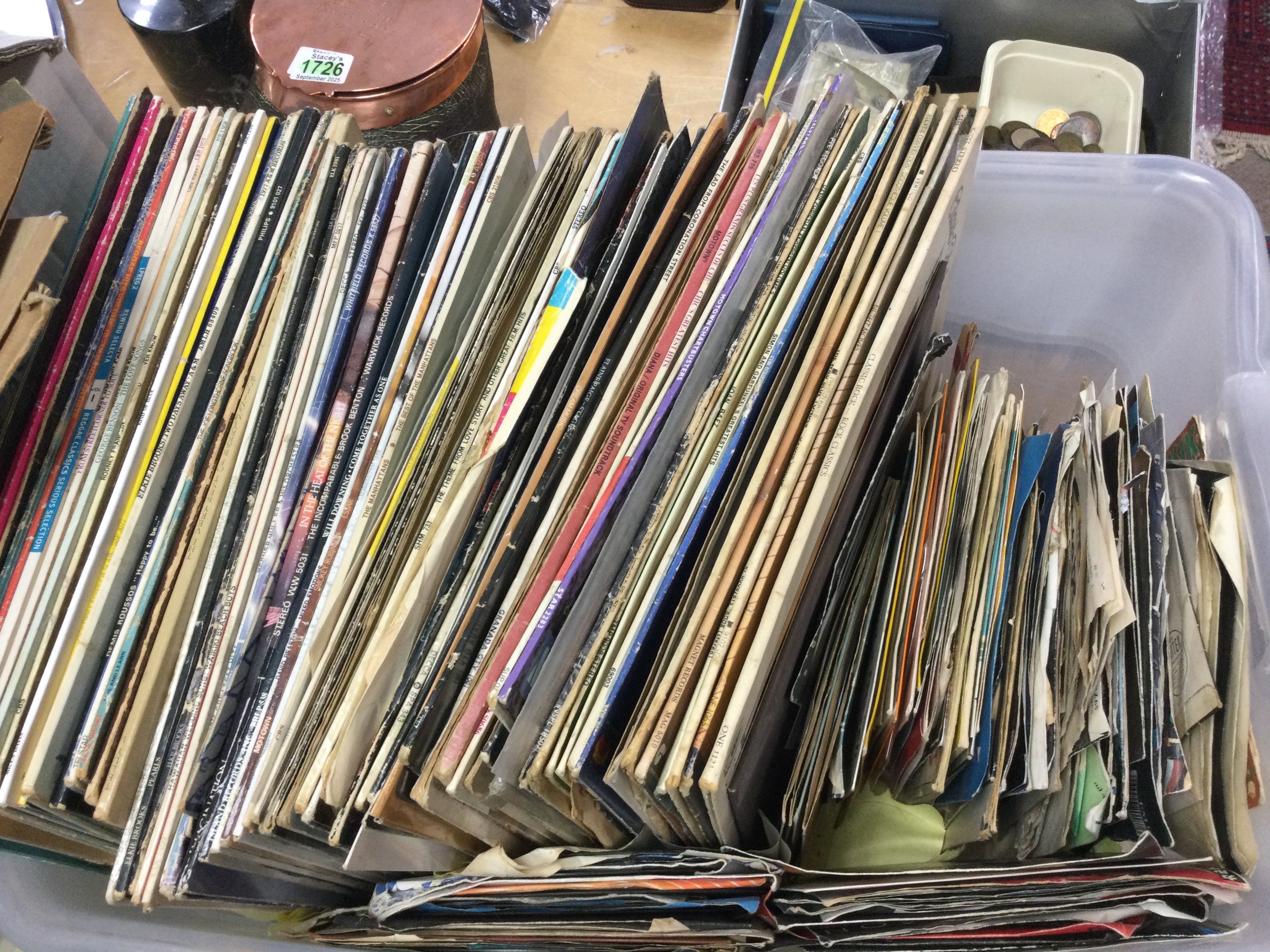 A collection of vinyl records LPS including the Eagles, Dire Straits, U2 etc and singles by Bowie, The Stranglers etc