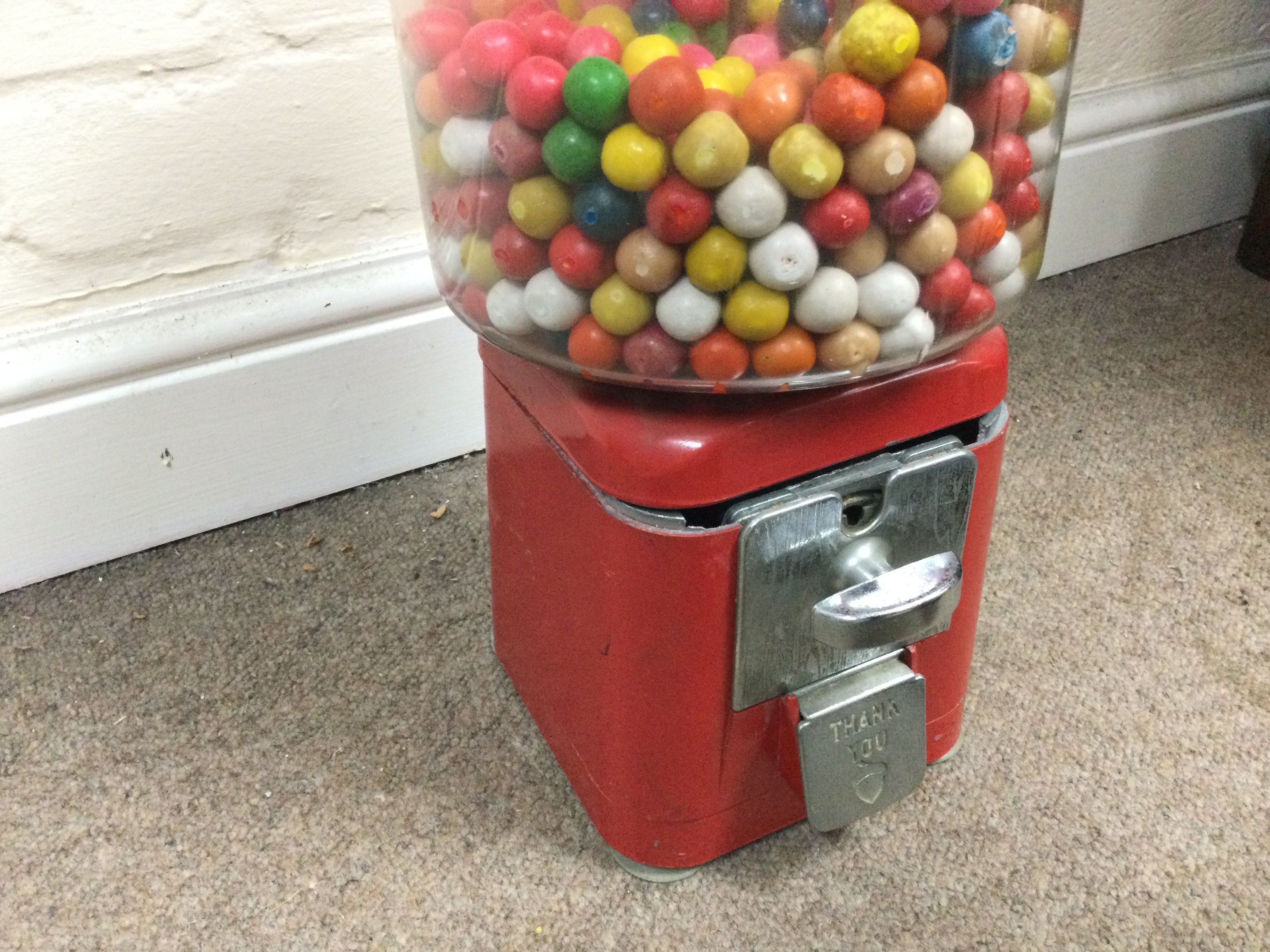 A vintage American coin op bubble gum machine. Approximately 43 cm by 16cm,- NO RESERVE