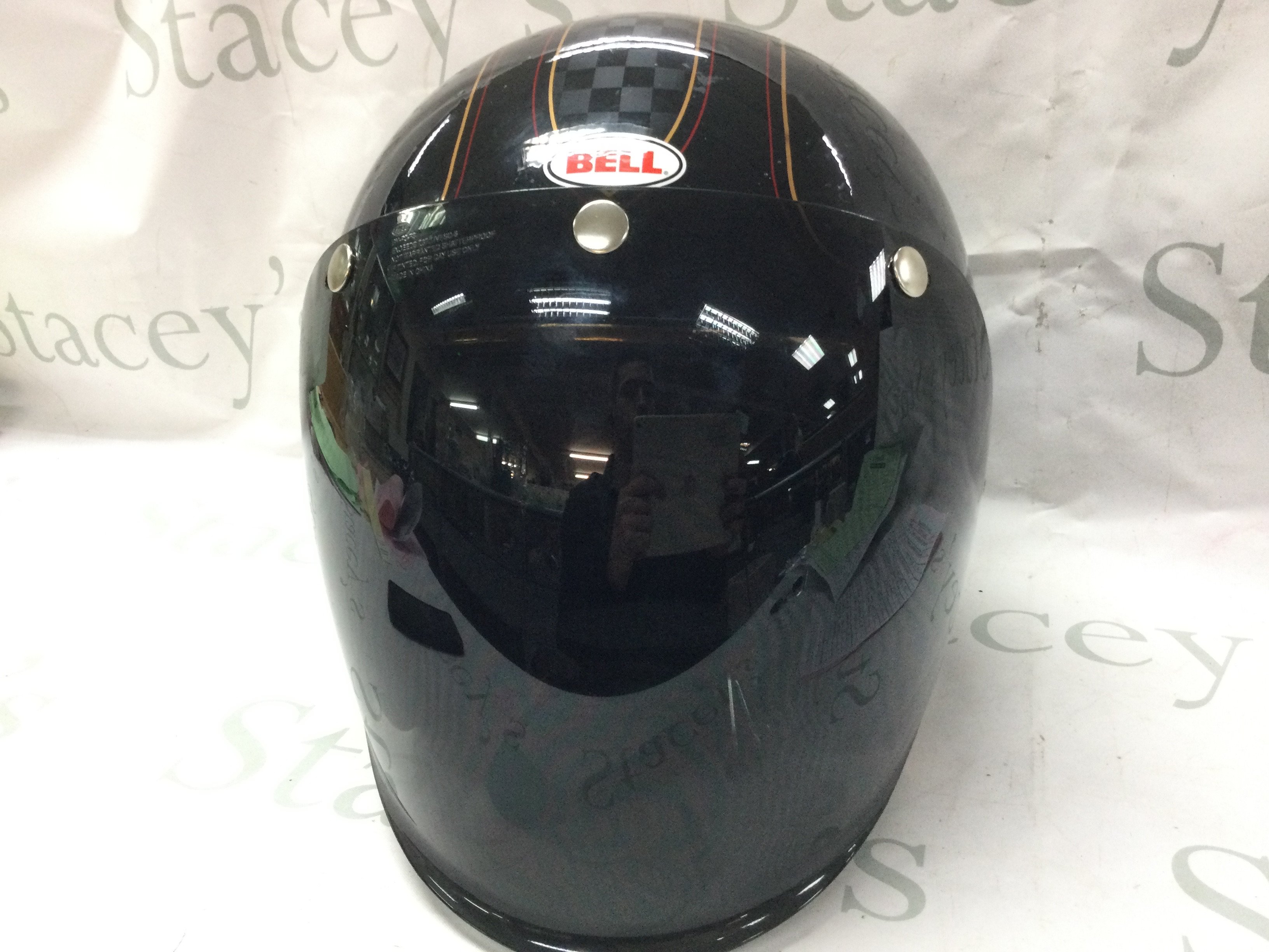 Bell Motorcycle helmet with visor . This lot cannot be posted