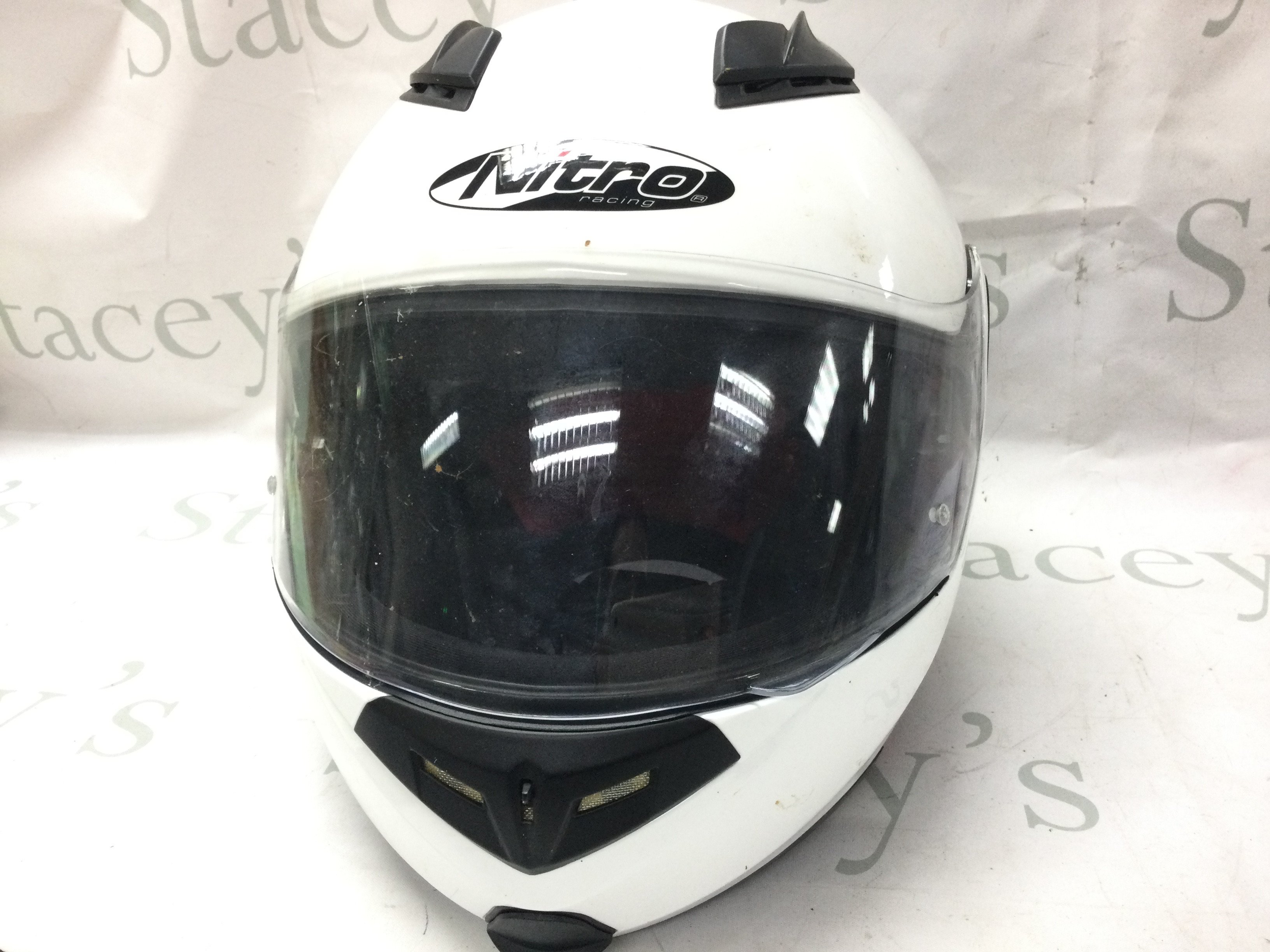 A nitro crash helmet. This lot cannot be posted