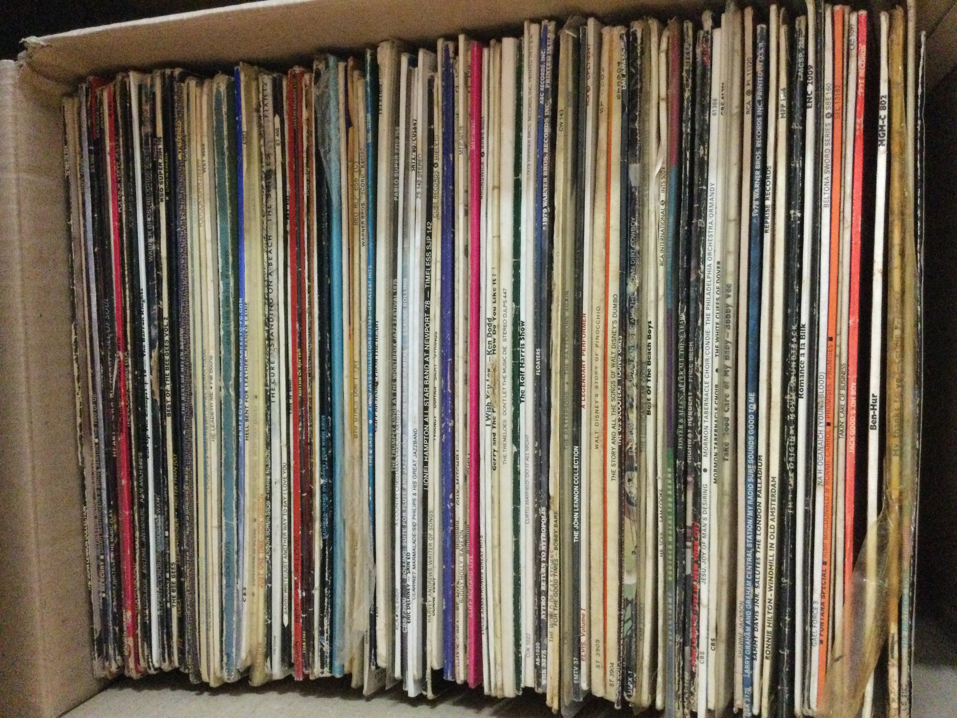 Two boxes of LPs and 78s by various artists including The Cure, Gene a Vincent, Michael Jackson and many more.