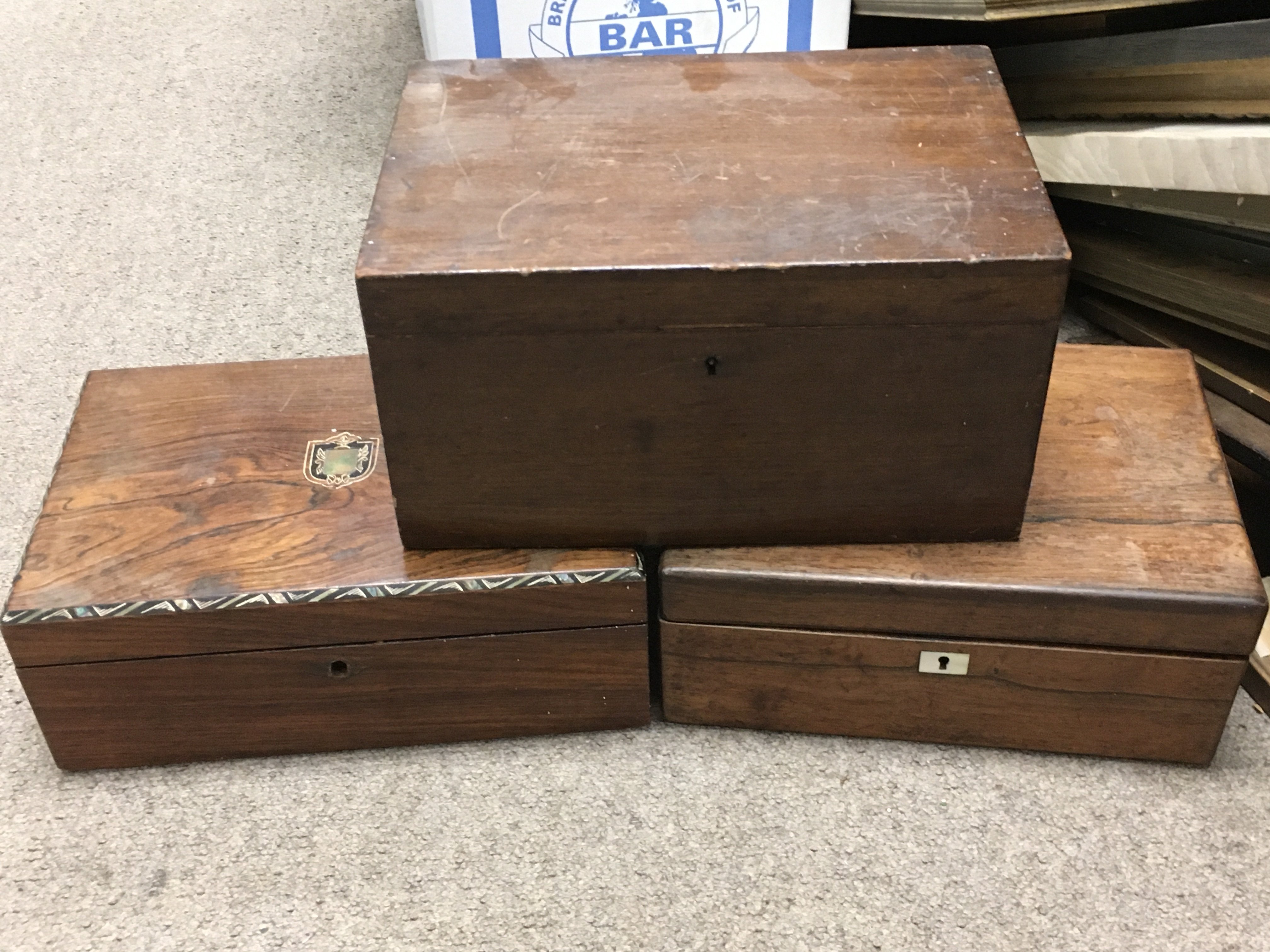 Three work boxes and a smaller box.no reserve