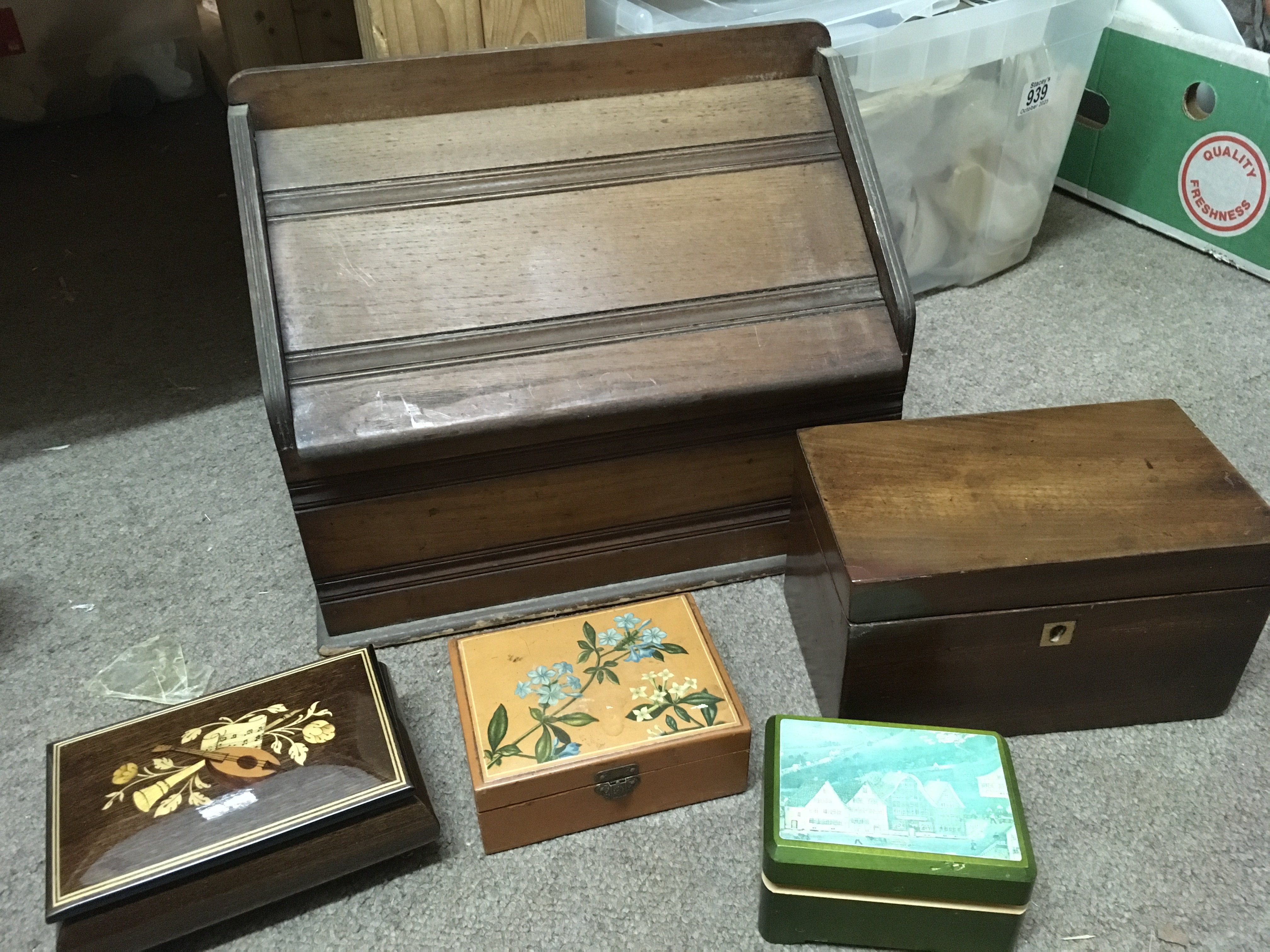 Boxes including two small musical jewellery boxes .