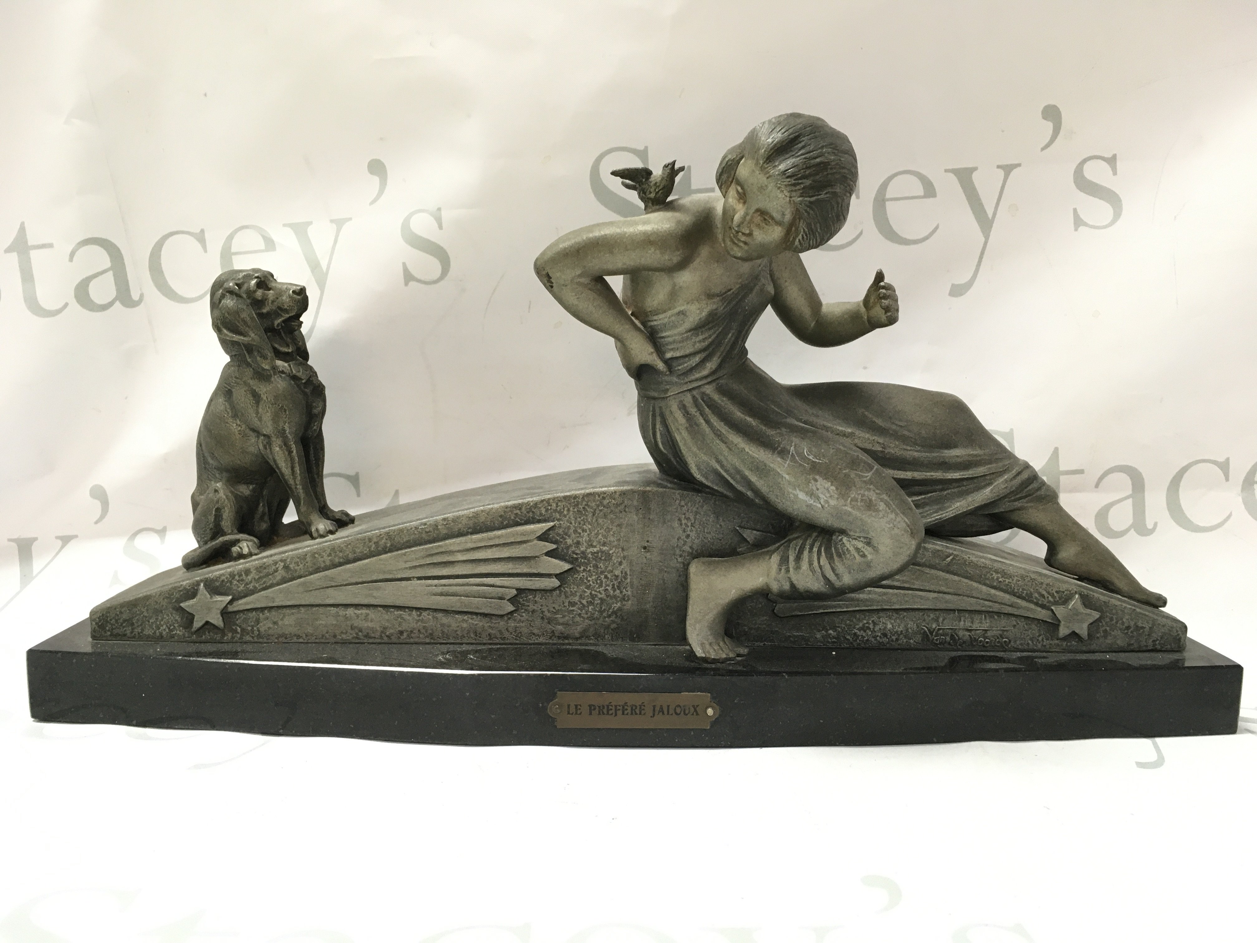 A French spelter art deco figure Georges Van De Voorde, Le Prefere Jaloux .24cm tall 50cm wide . This lot cannot be posted