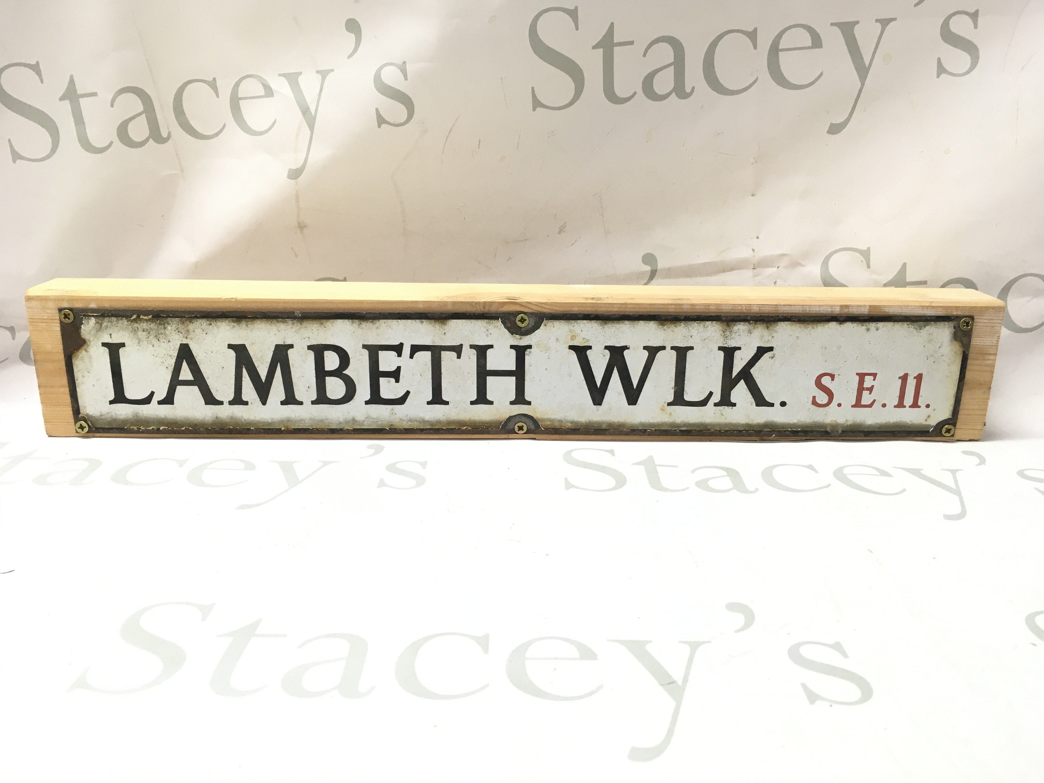 An Enamel Lambeth walk S.E.11 sign, 53cm long approximately