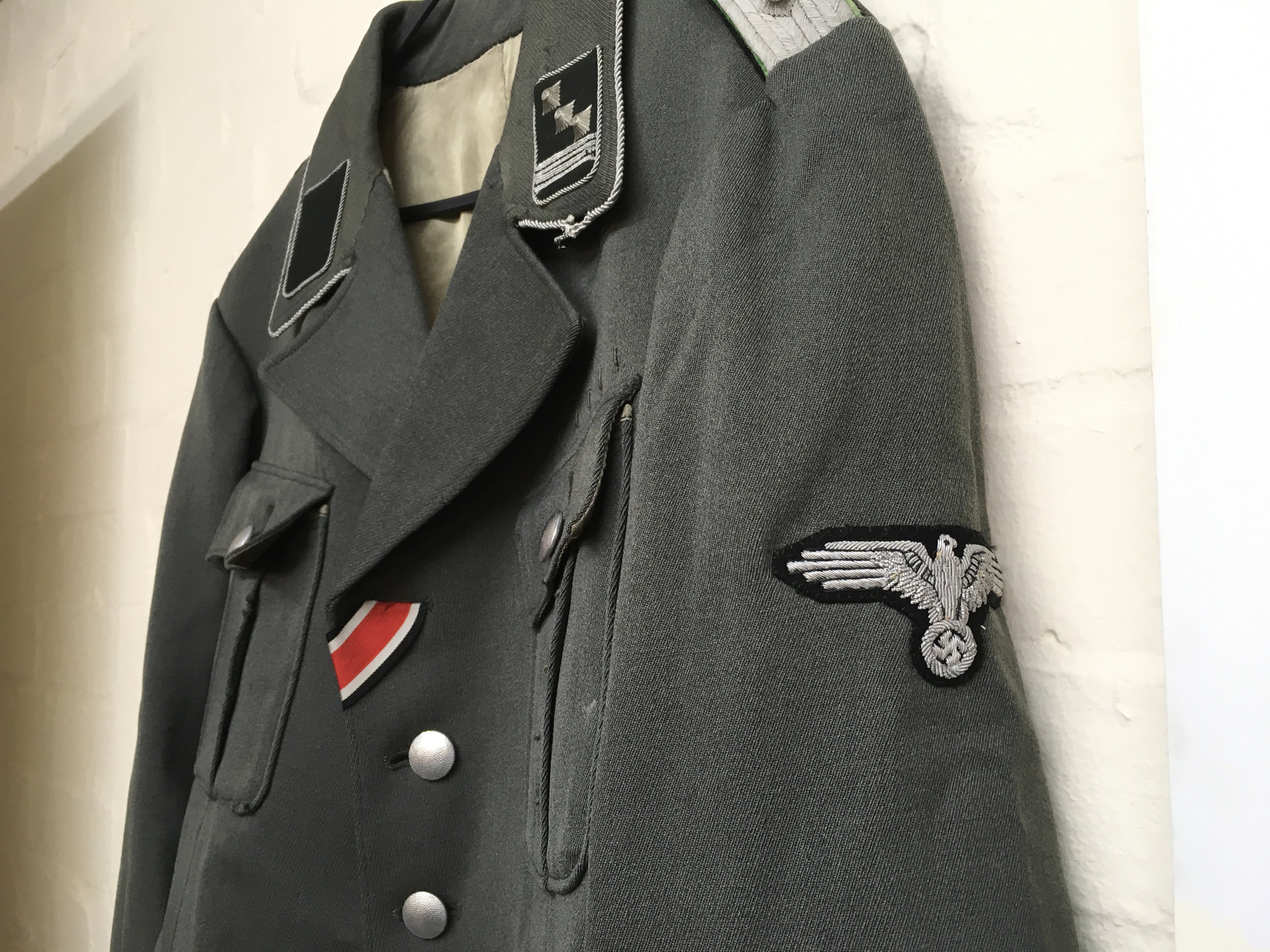 A WW2 German Third Reich Tunic M38 for a Hauptstrumfuher of the security service (SD) with silk lining and an opening for side arm . Postage category C