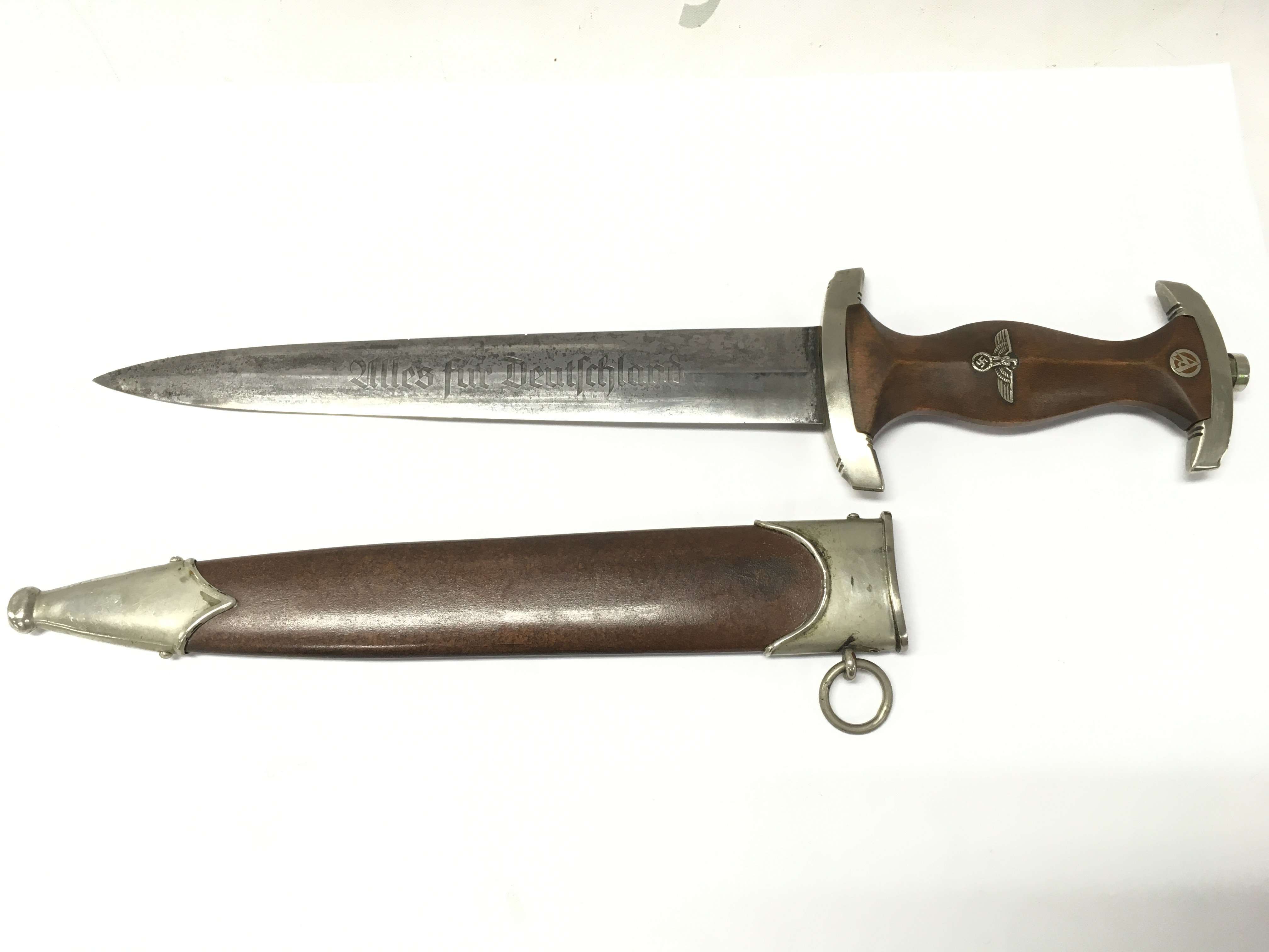 A rare WW2 German Third Reich S.A full Rohm honour dagger by SMF Solingen with inscriptions- Alles Fur Deutschland and the reverse- In Herzlicher Kameradschaft Ernst Rohm. With anodised scabbard. blade 22.5cm long approximately 35cm total dagger length. This lot cannot be posted
