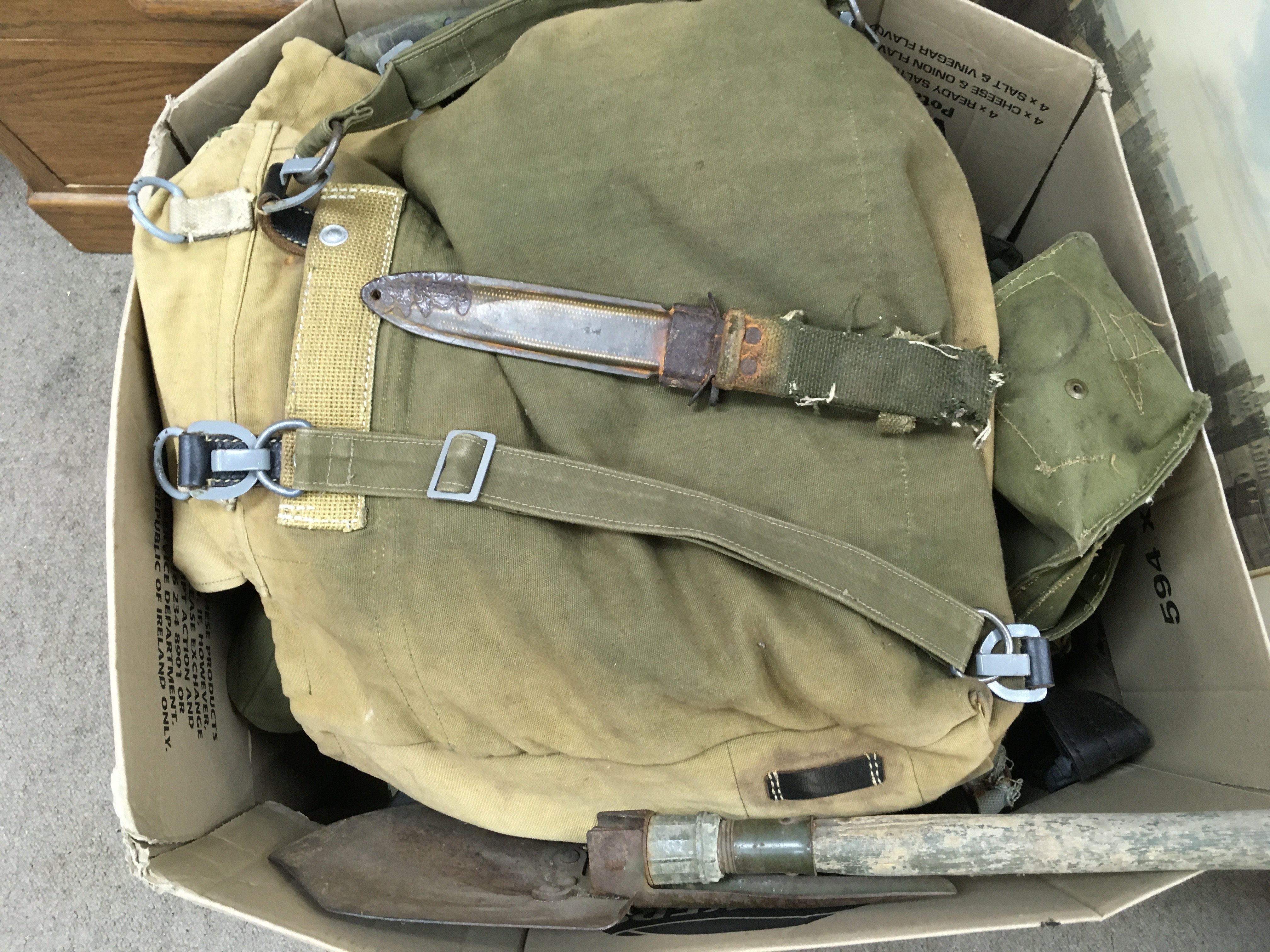Military items including an entrenching tool, combat knife , various bags etc