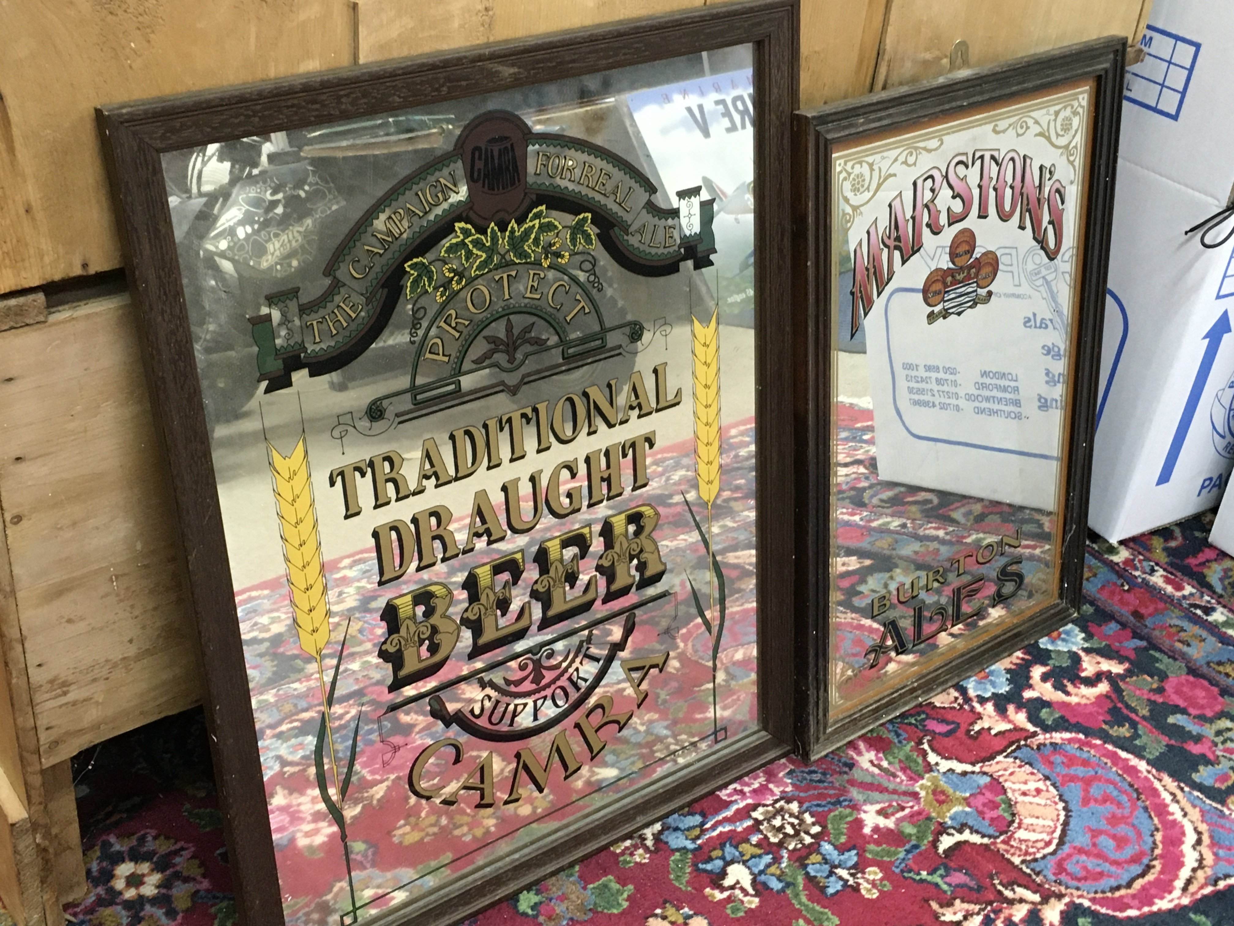 Two pub advertising mirror signs , Camra ( frame size 47x60) and Marstons Burton Ales (dimensions 52x34cm) . This lot cannot be posted