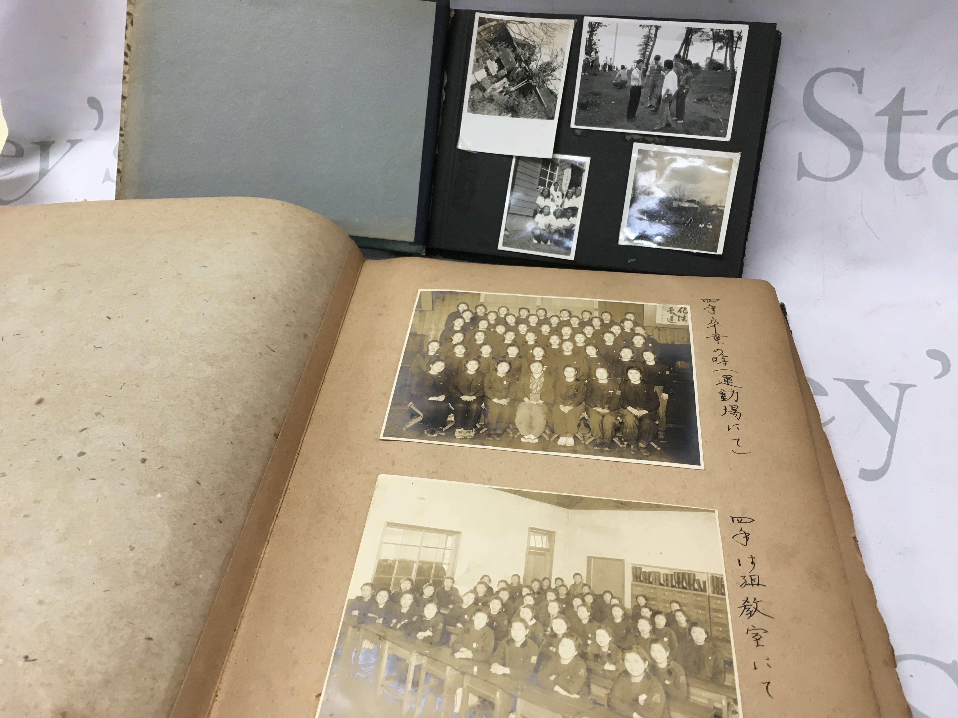 Two albums of WW2 period Japanese family photo albums including postcards . Postage category C