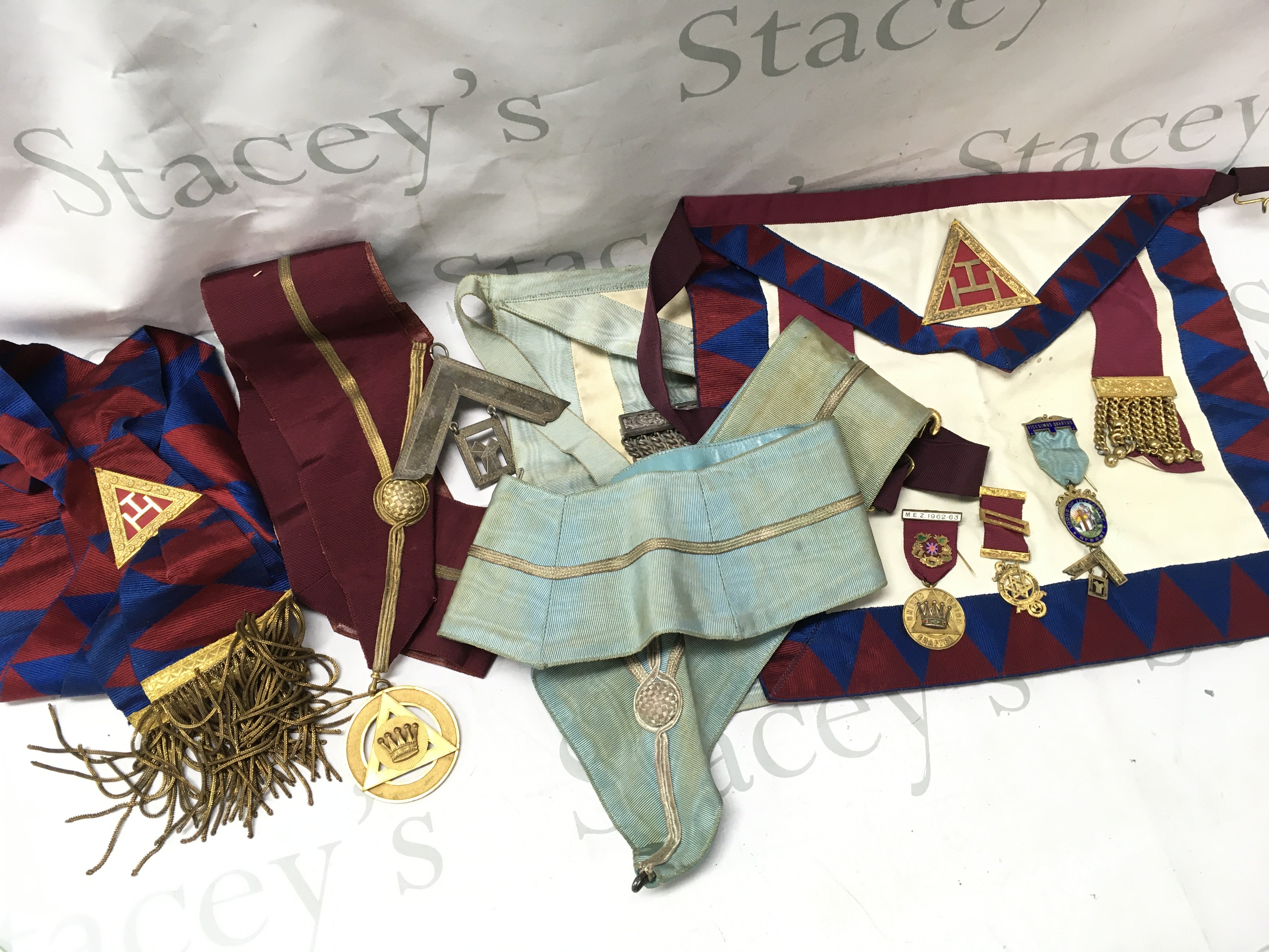 Masonic Regalia and three silver medals , postage catC