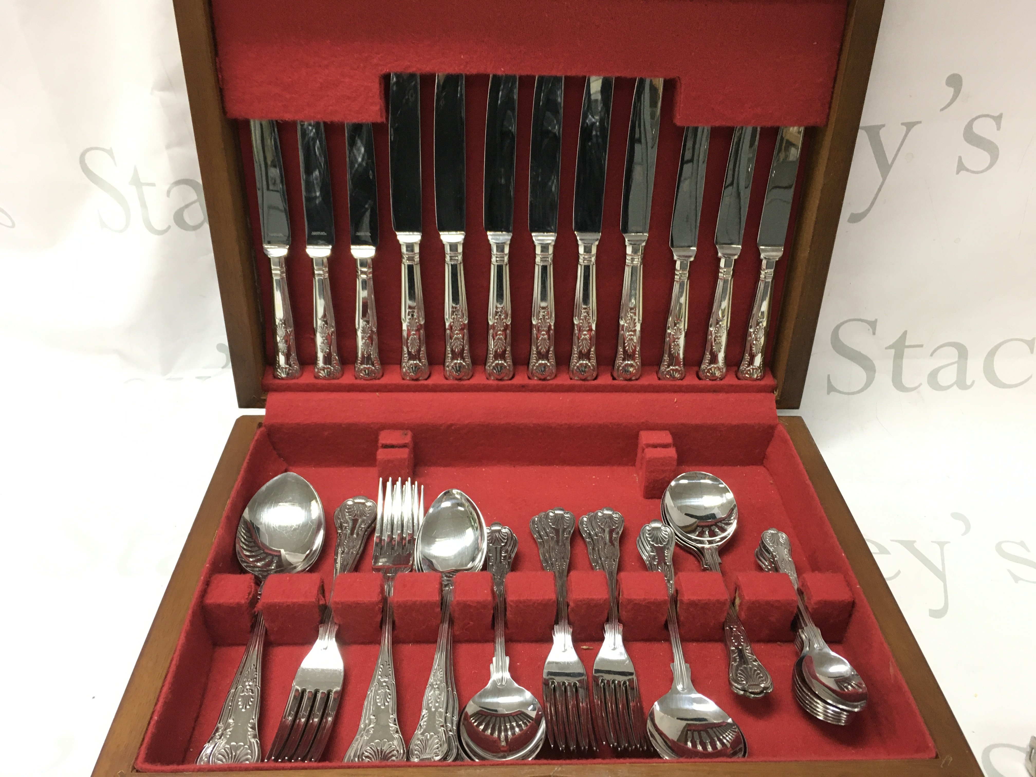 A canteen of Sheffield stainless steel cutlery . Postage catC
