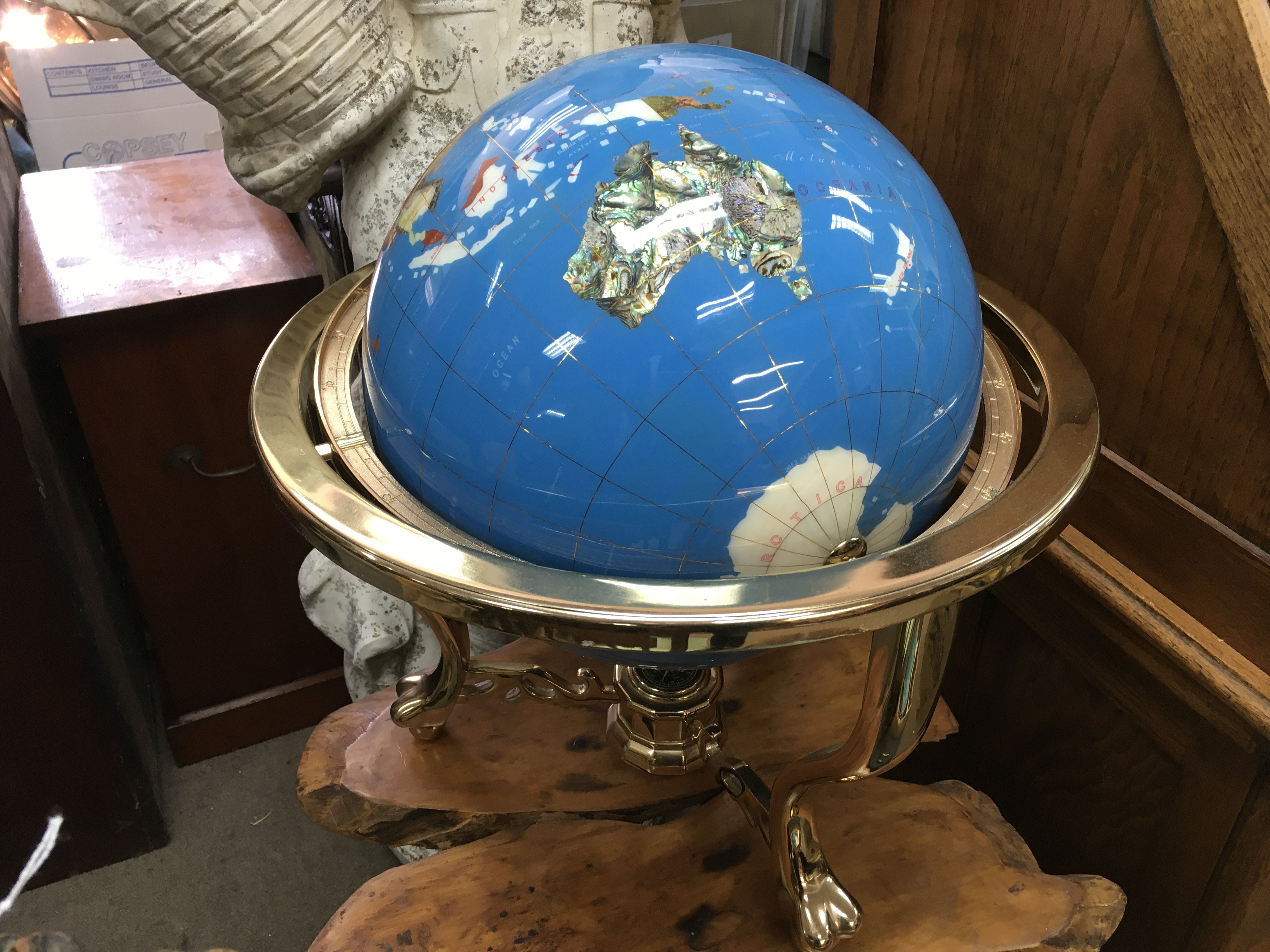 A gemstone globe, 50cm tall approximately . This lot cannot be posted