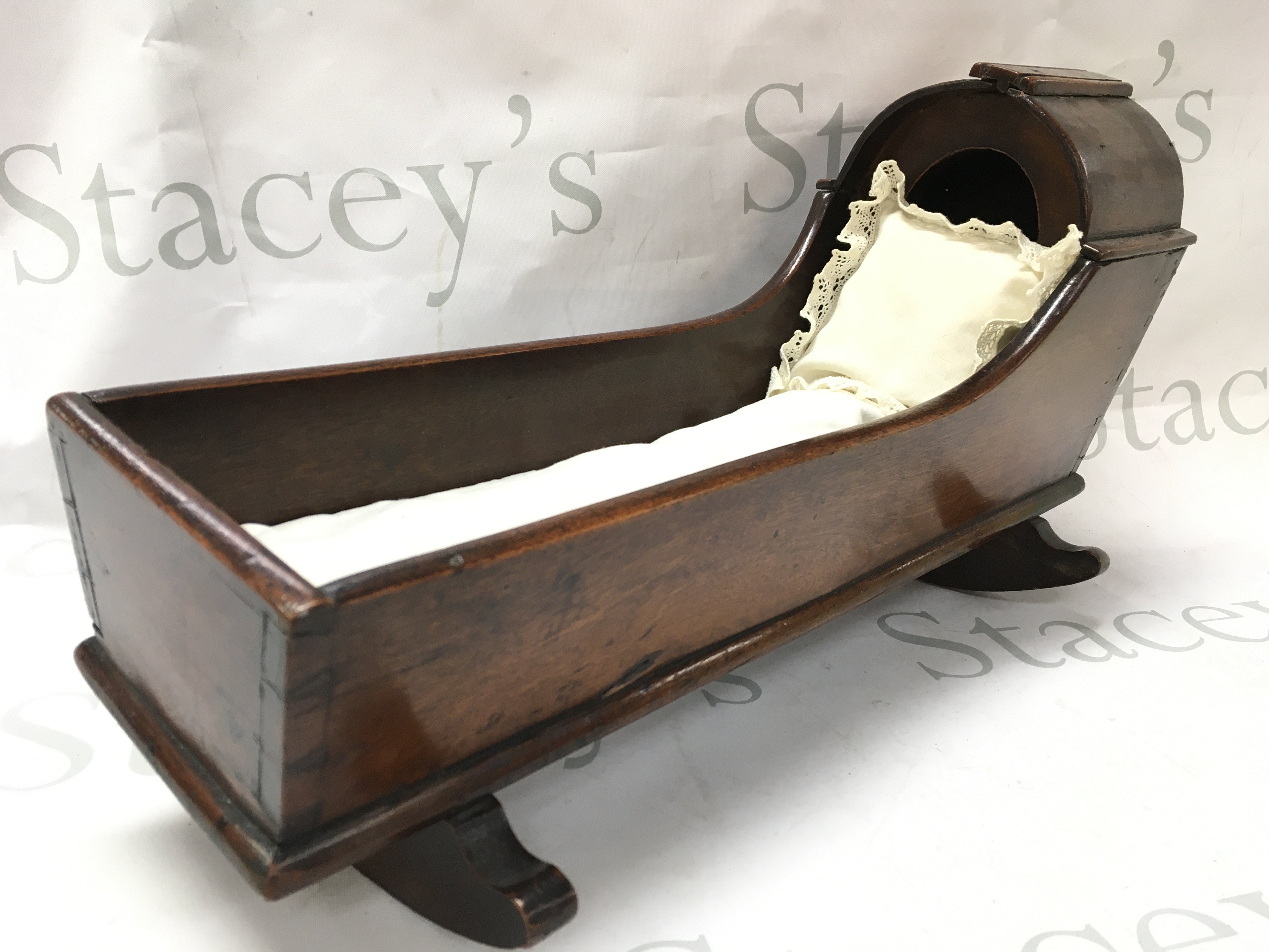 A small Georgian dolls crib, this lot cannot be posted 25cm tall 45cm long