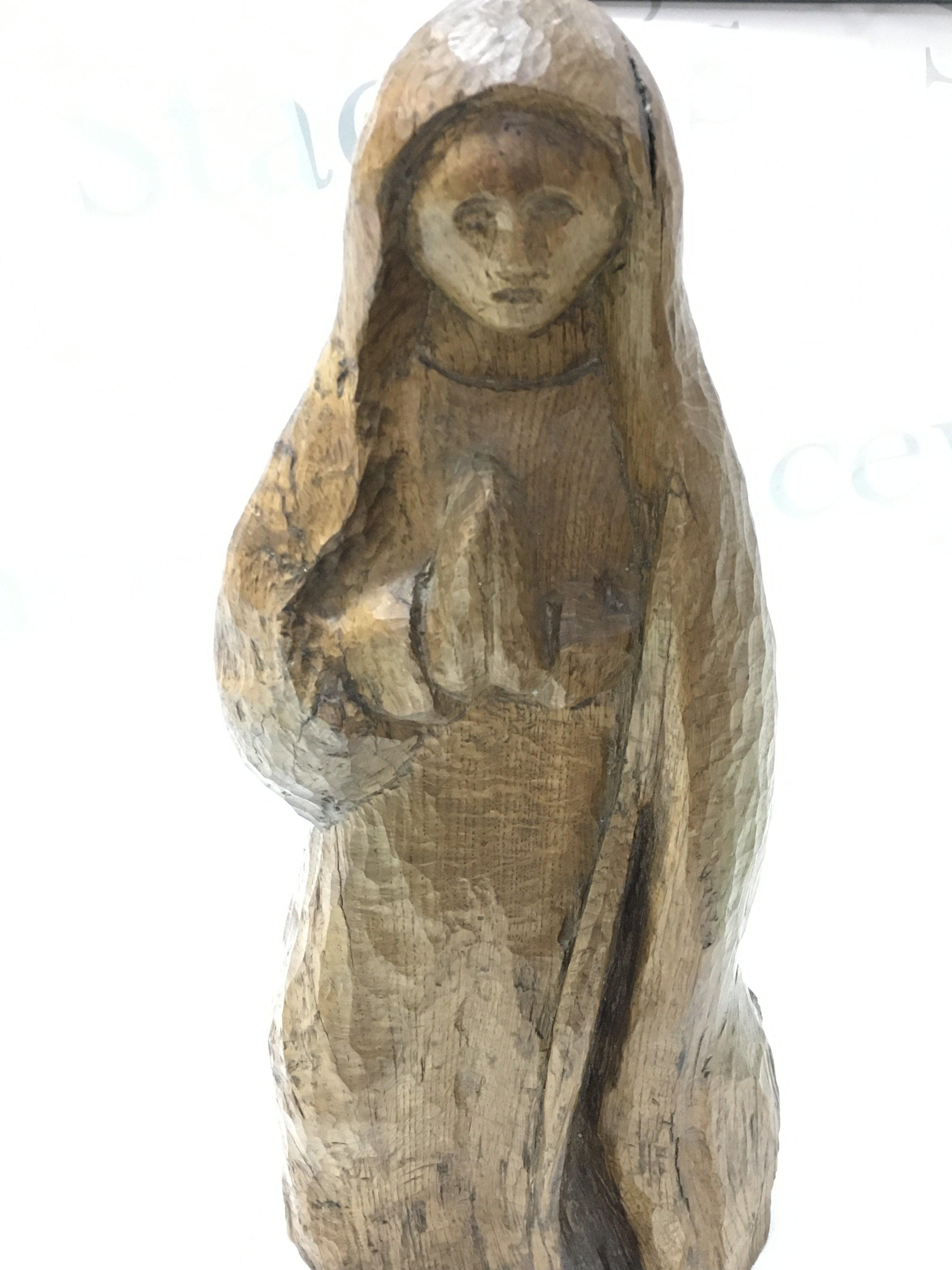 A 19th century oak figure of Mary ,46cm tall . This lot cannot be posted