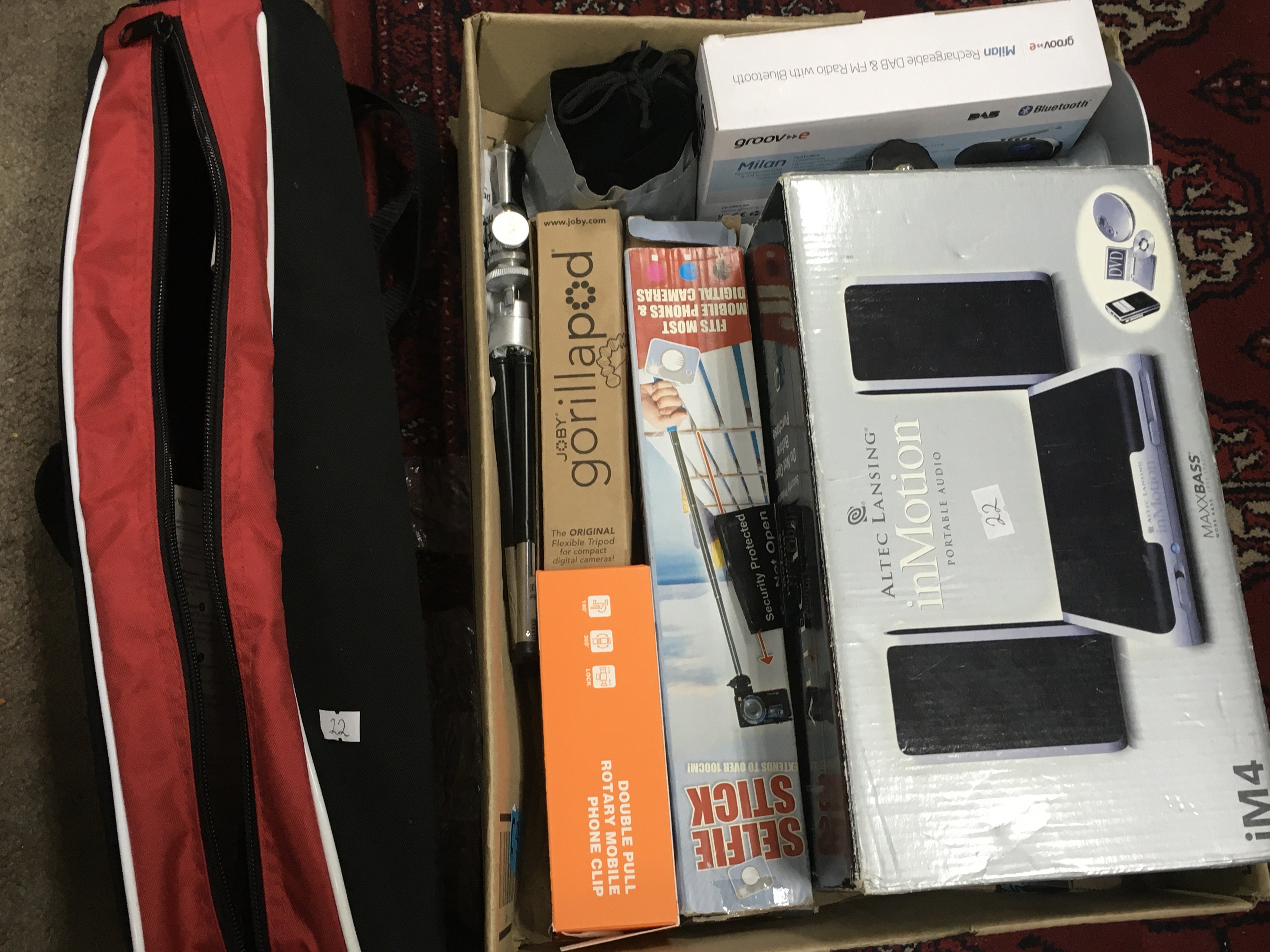 A Collection of tripods , boxed in motion portable audio , boxed Milan DAB & FM radio with bluetooth