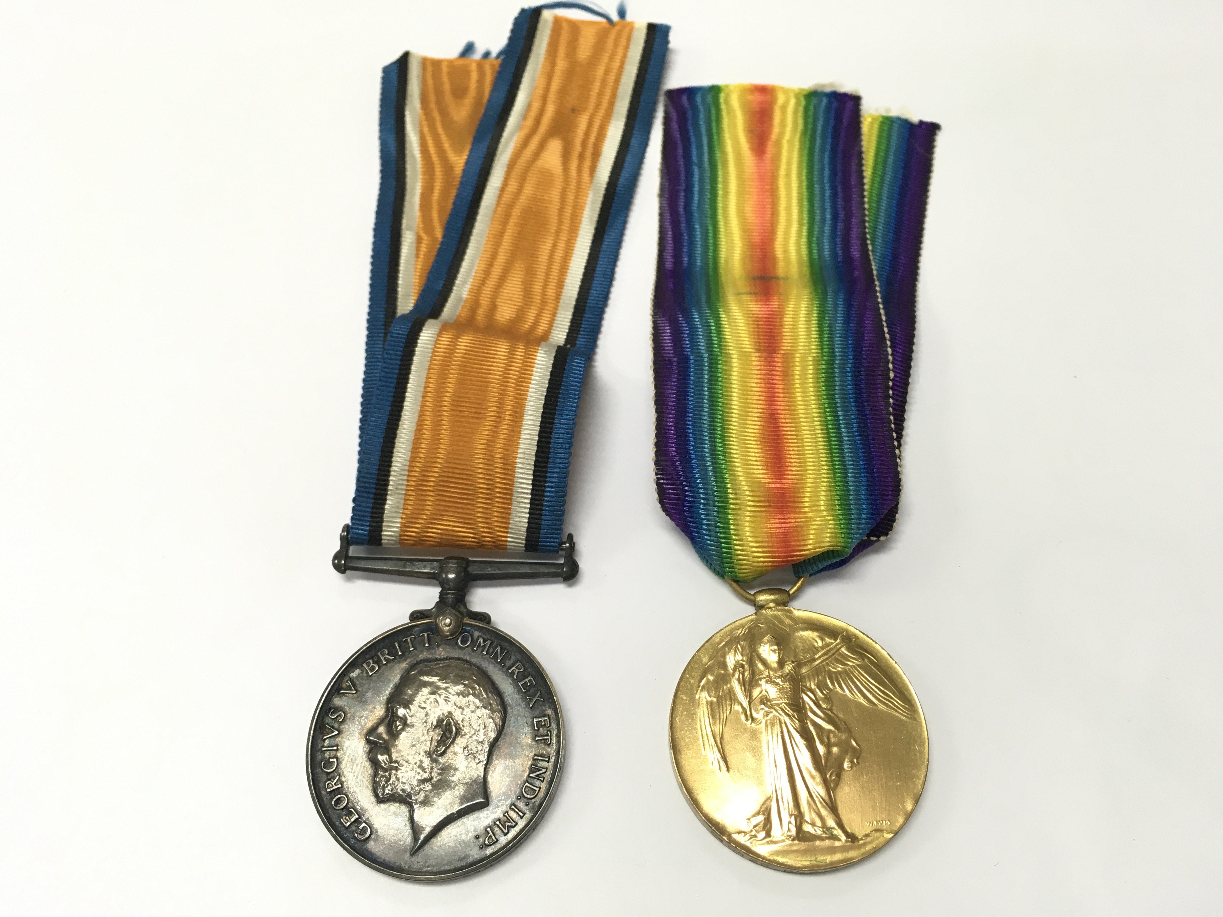 Two WW1 Medals including War and Victory medal presented to 240426 PNR.T.A.LAWS.R.E. Postage category A