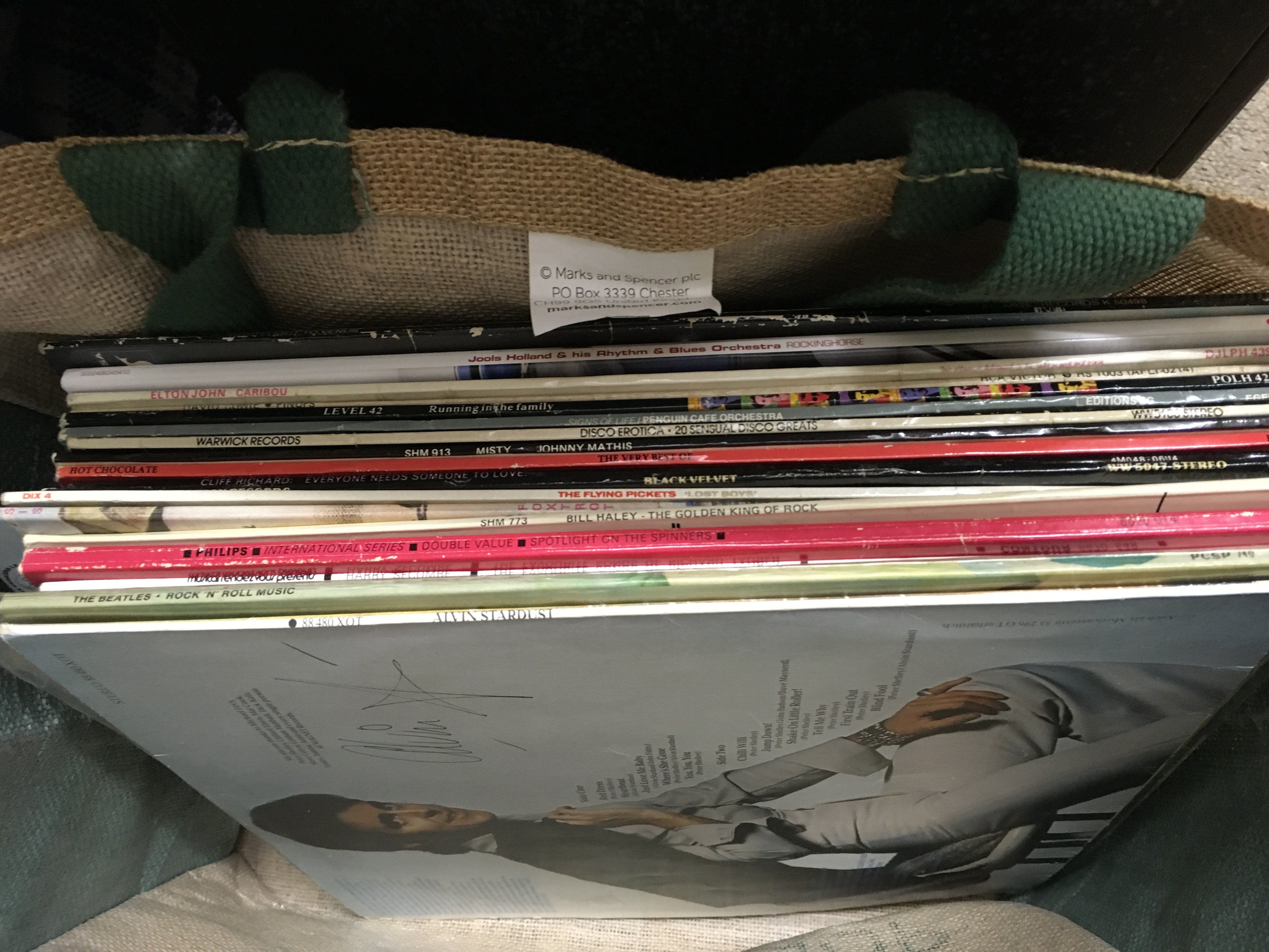 LPs and albums including David Bowie Pin Ups, Genesis Foxtrot, Beatles rock n roll music , John Lennon etc with player. No reserve