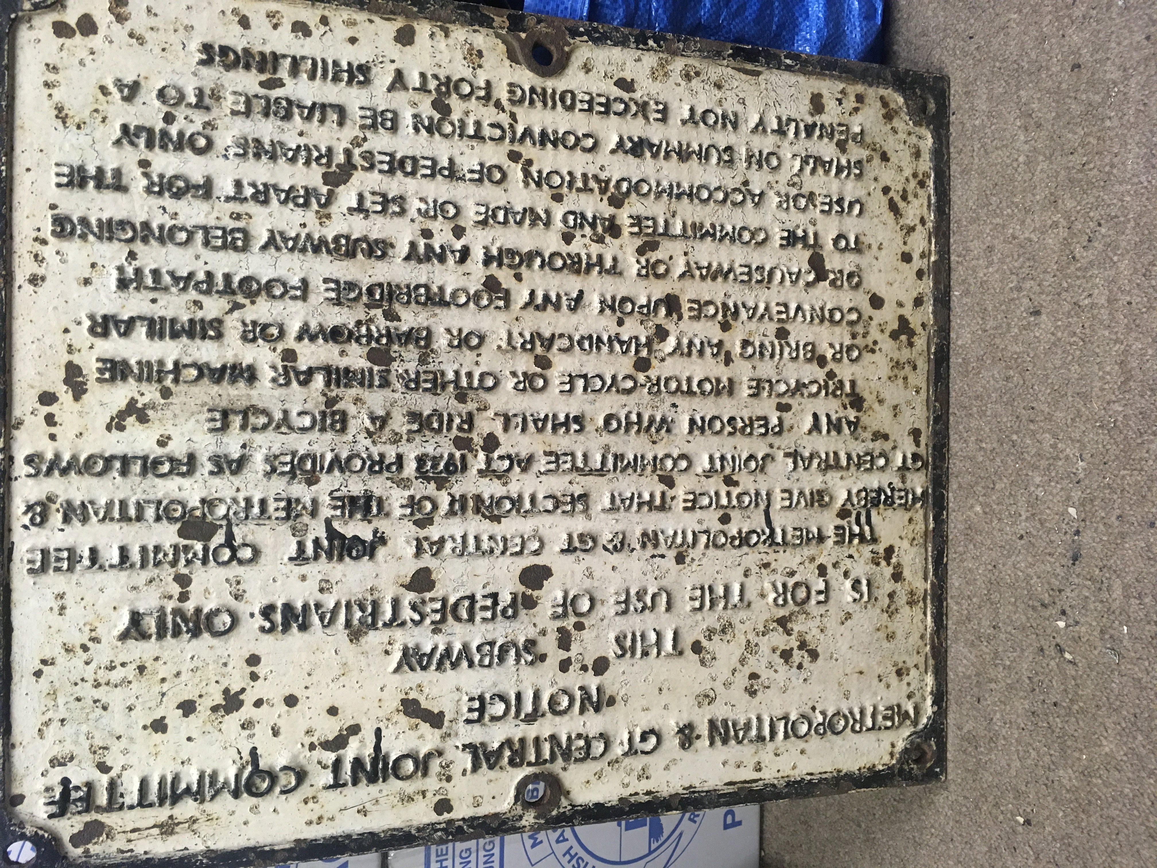 A cast iron railway sign metropolitan notice use of pedestrian only. 52 cm x 62 cm .