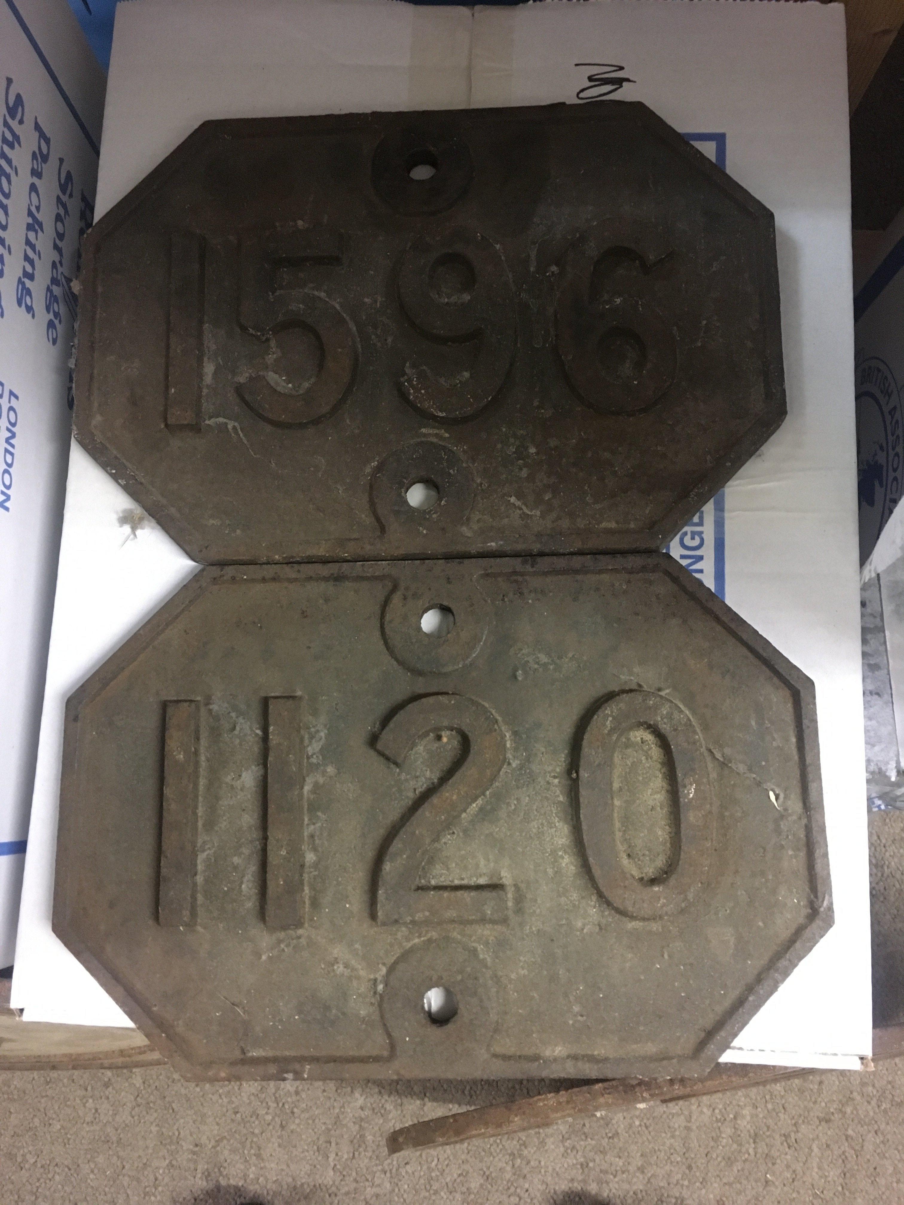 Two cast iron bridge plates 1120 and 1596 .