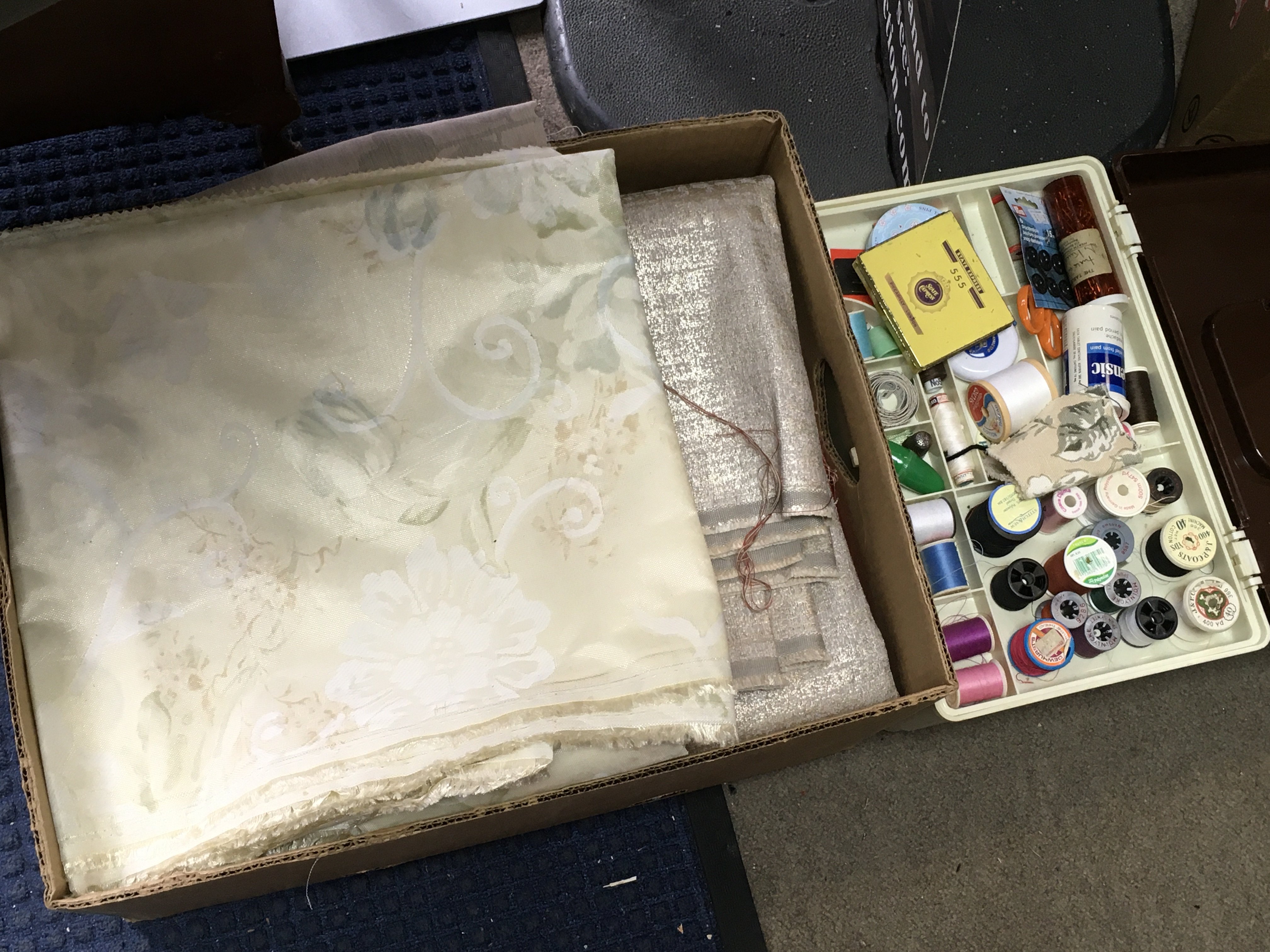 Two sewing boxes , sewing machine and linen