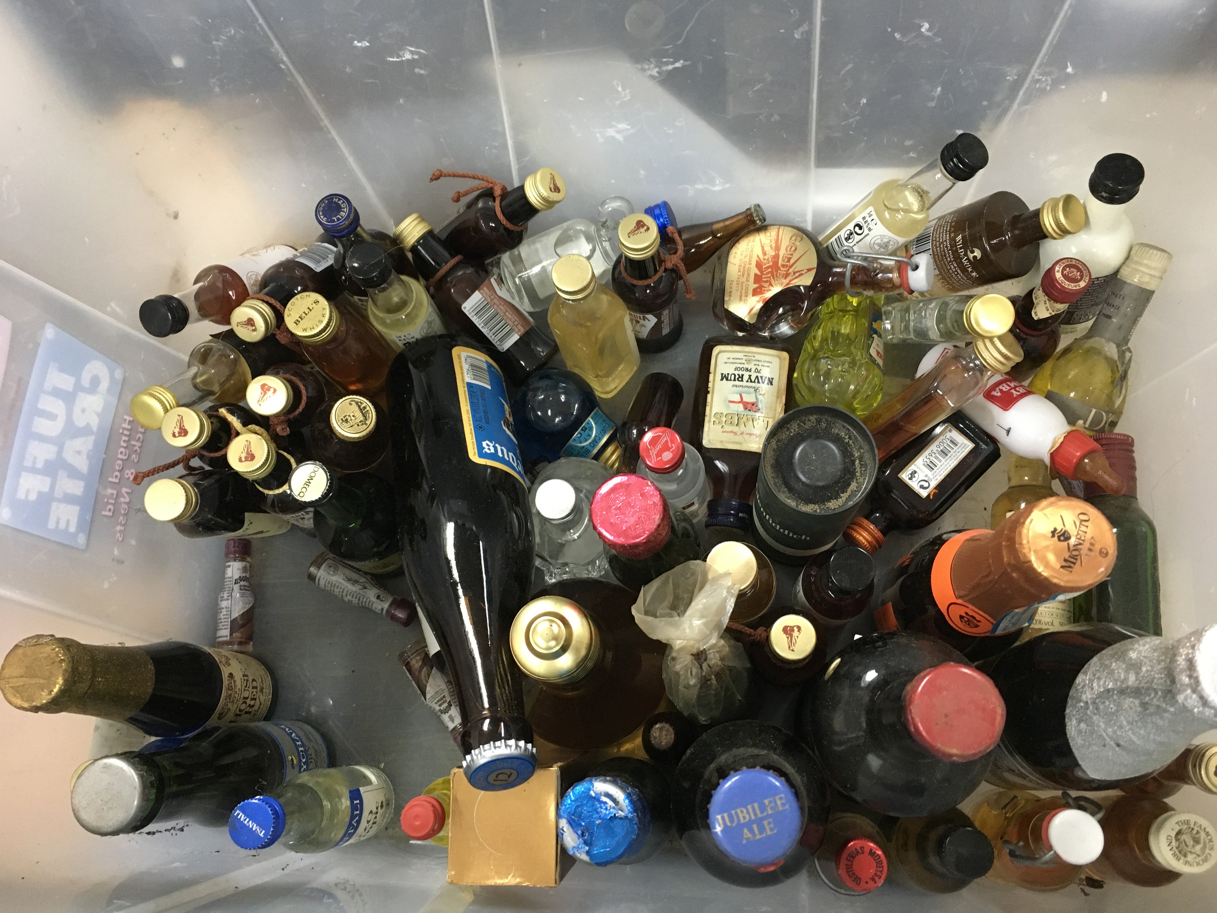 A collection of miniature alcohol including whiskey etc