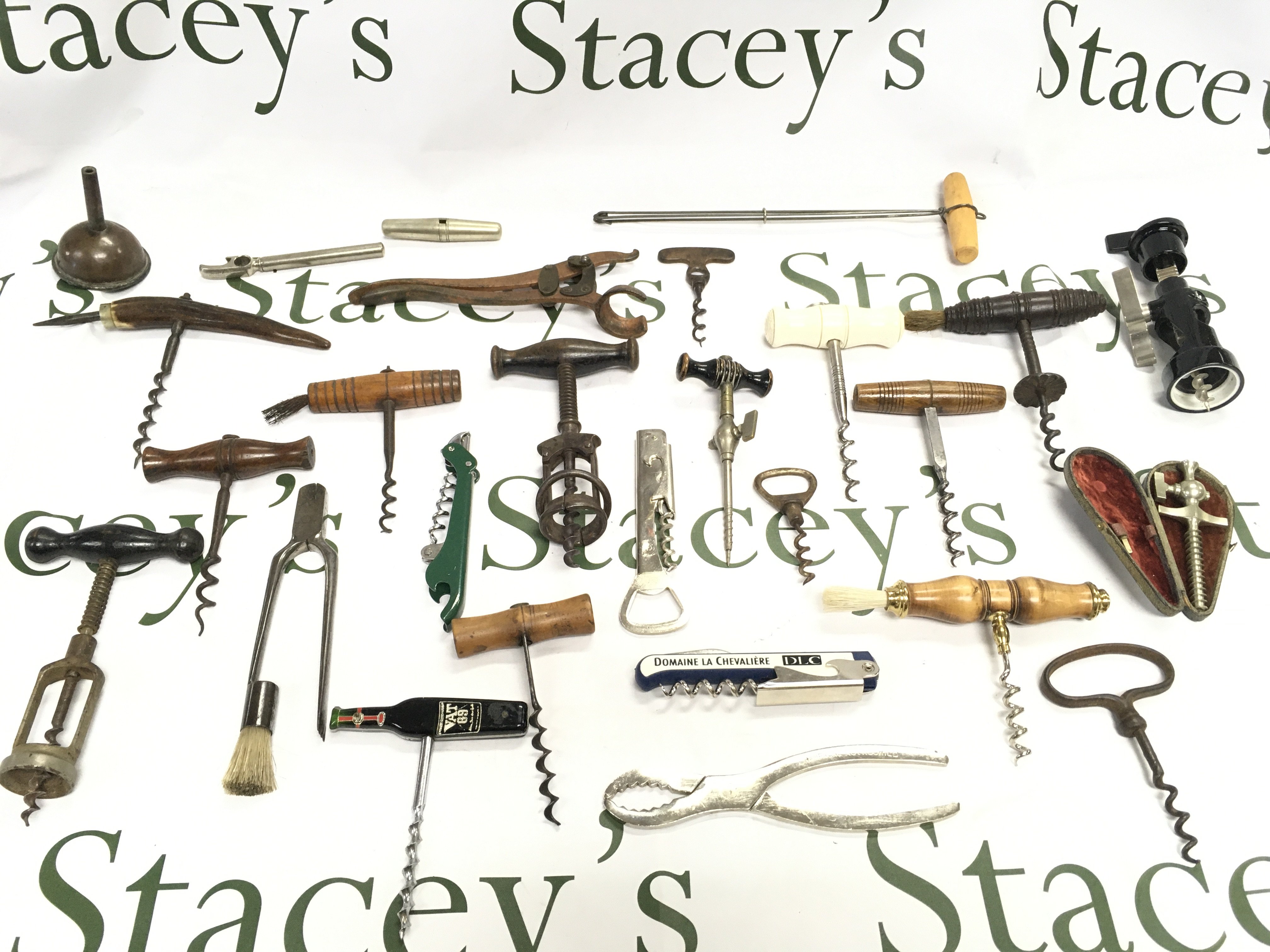 A nice collection of Victorian and later bottle openers corkscrews etc.Postage B