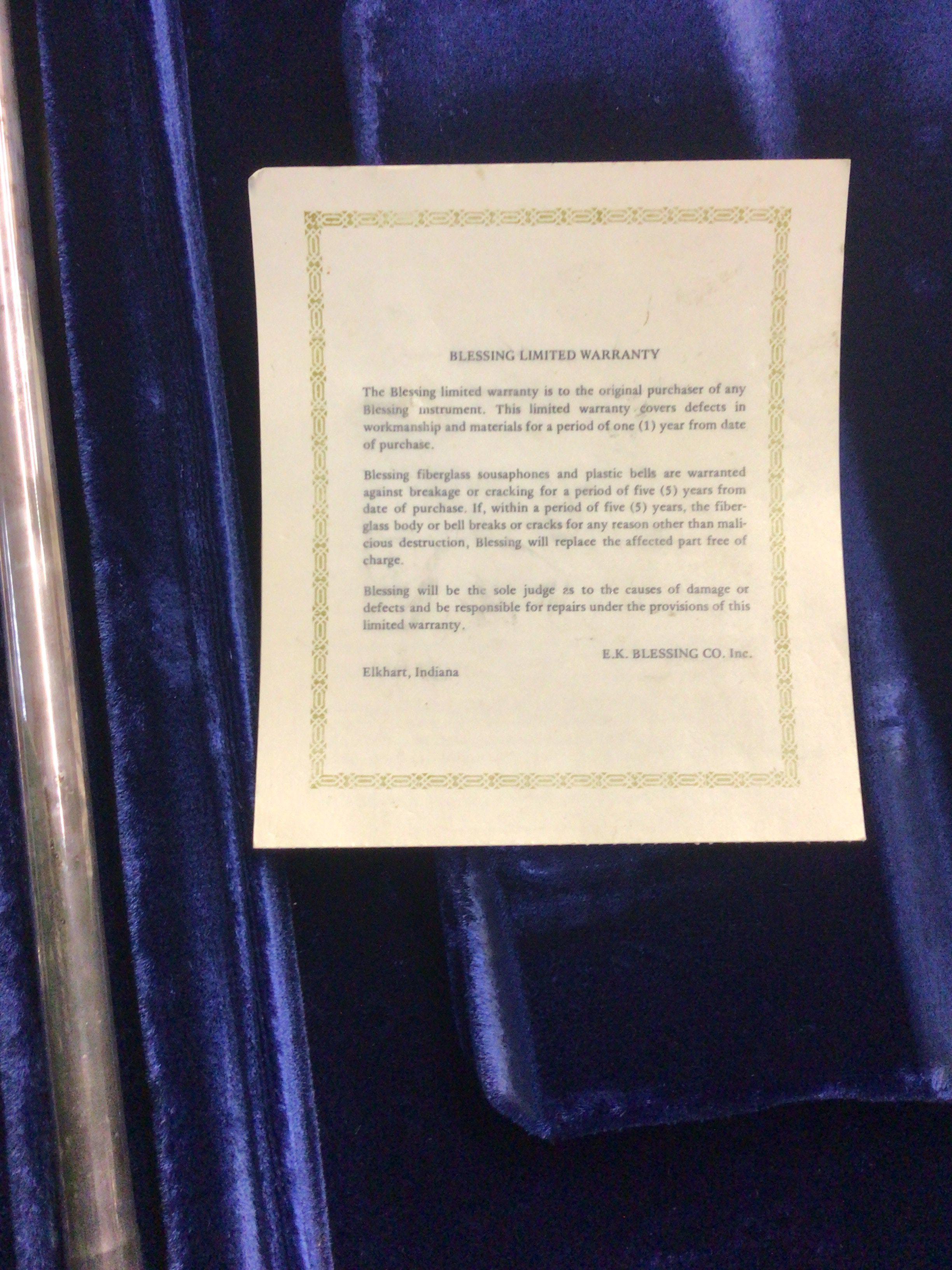 An American Chrome finished Blessing & Co trombone in a fitted case with Warranty card.