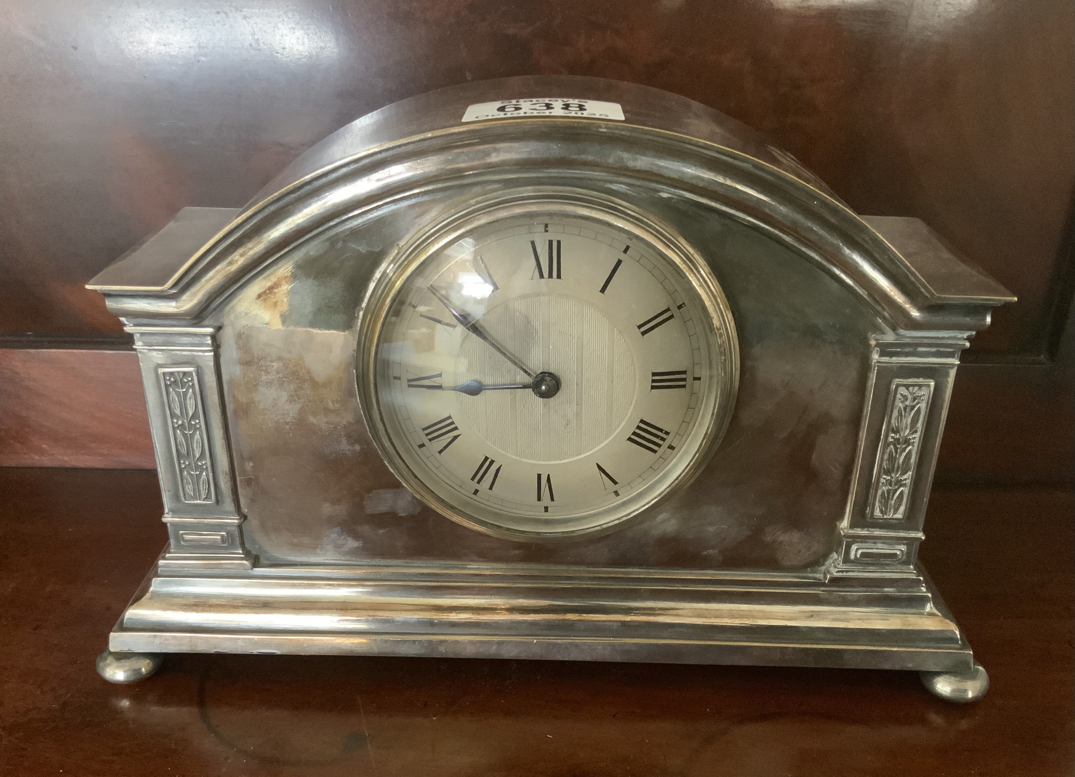 A Buren silver plated mantle clock. 25cm x 15.5cm x 8cm