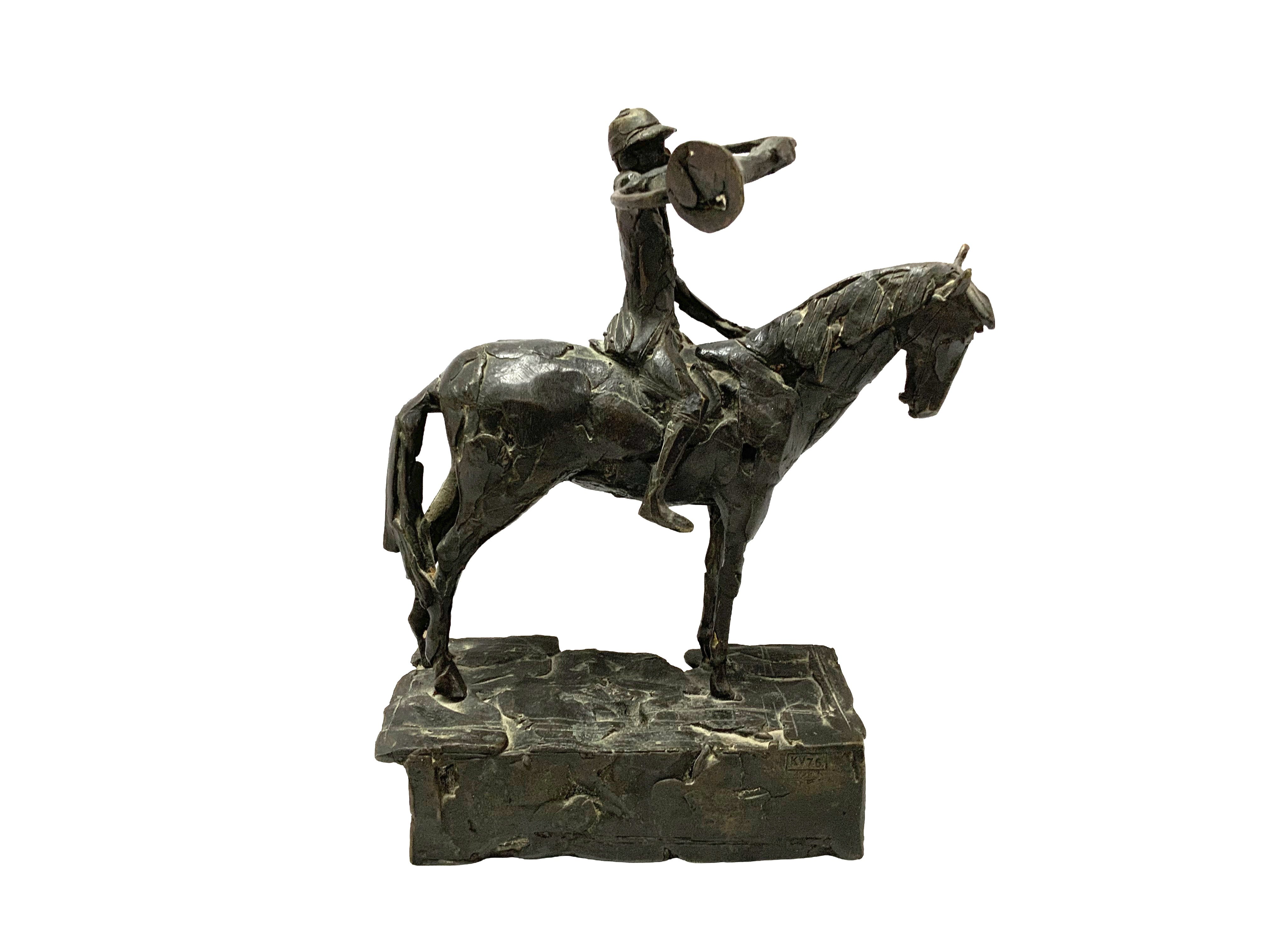 A modern studio bronze figure of Huntsman on horseback.