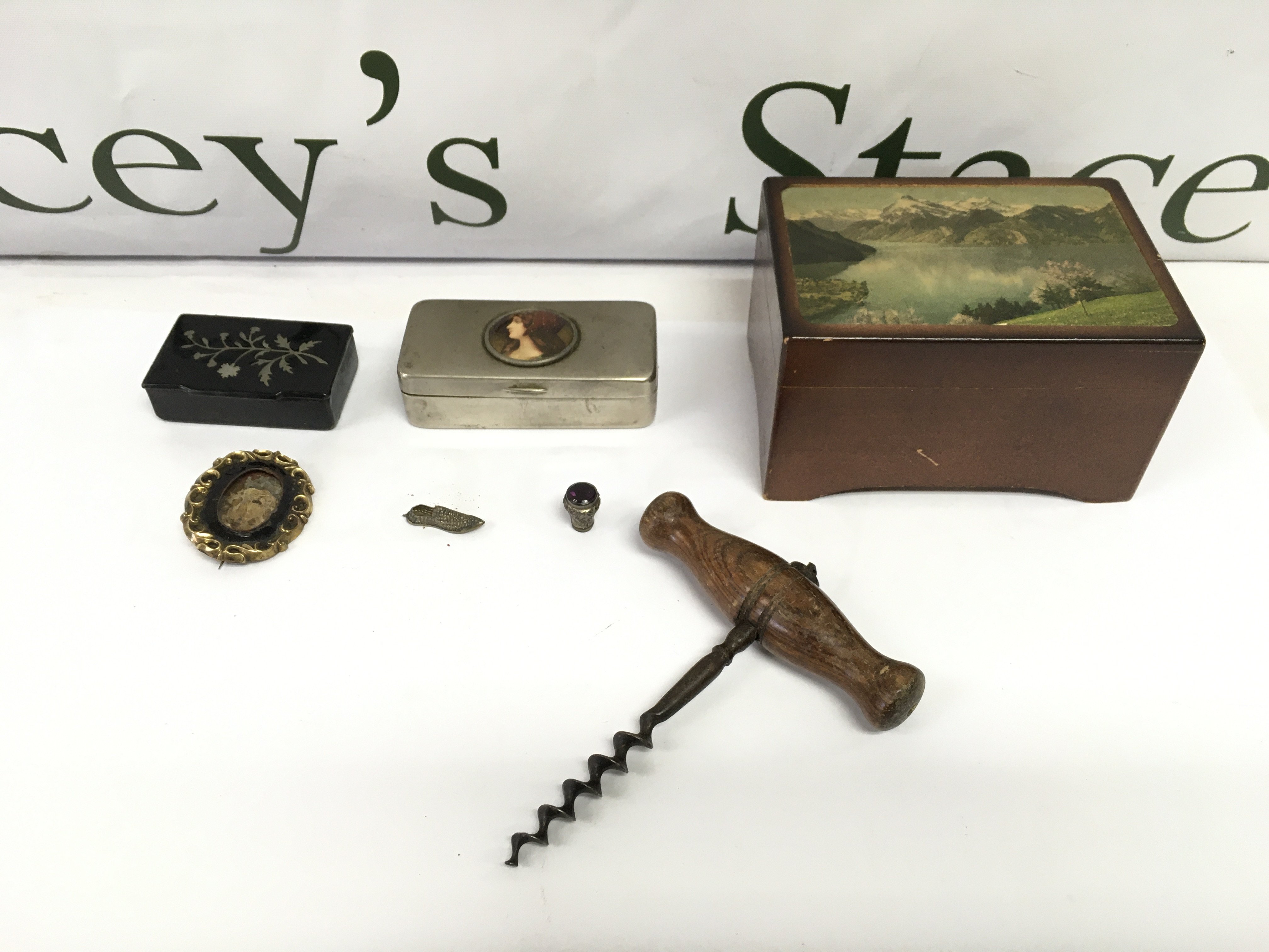 A collection or small boxes a corkscrew and other oddments Postage B