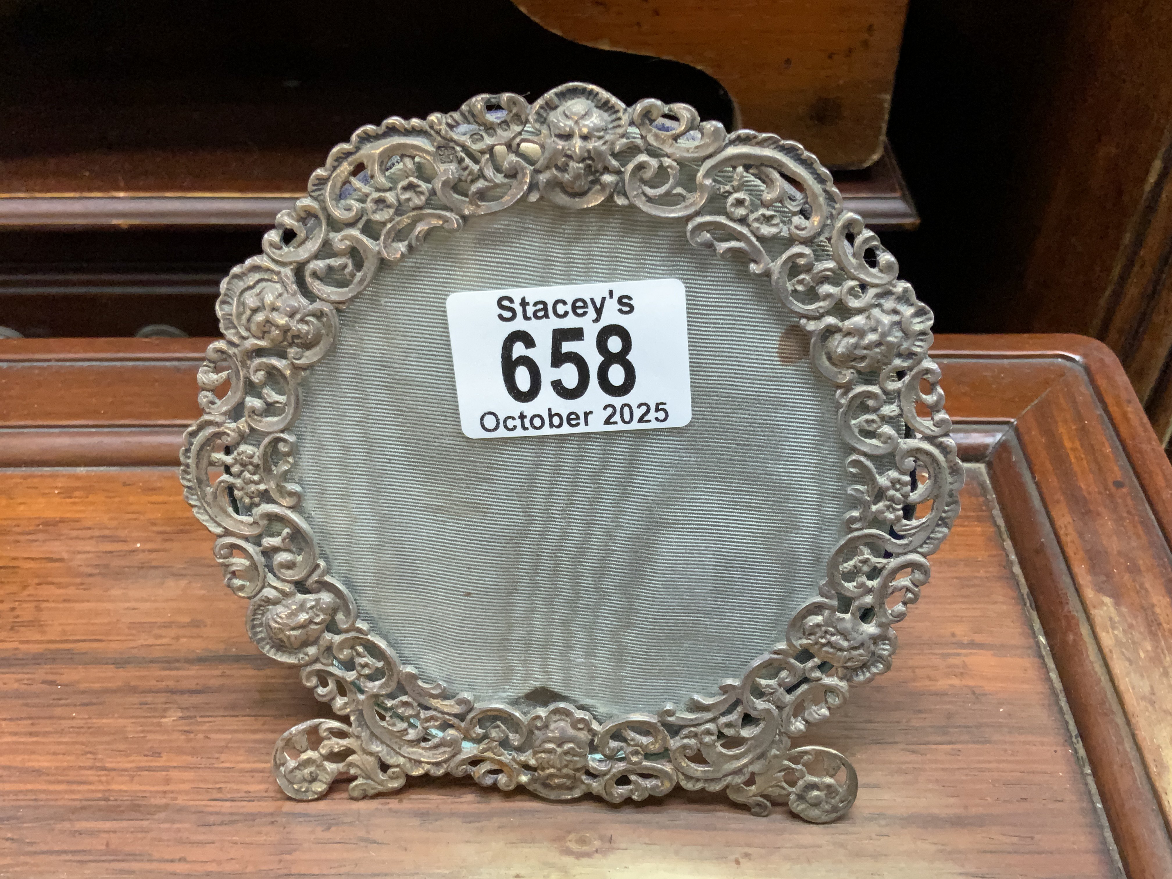 A small hallmarked silver photo frame.