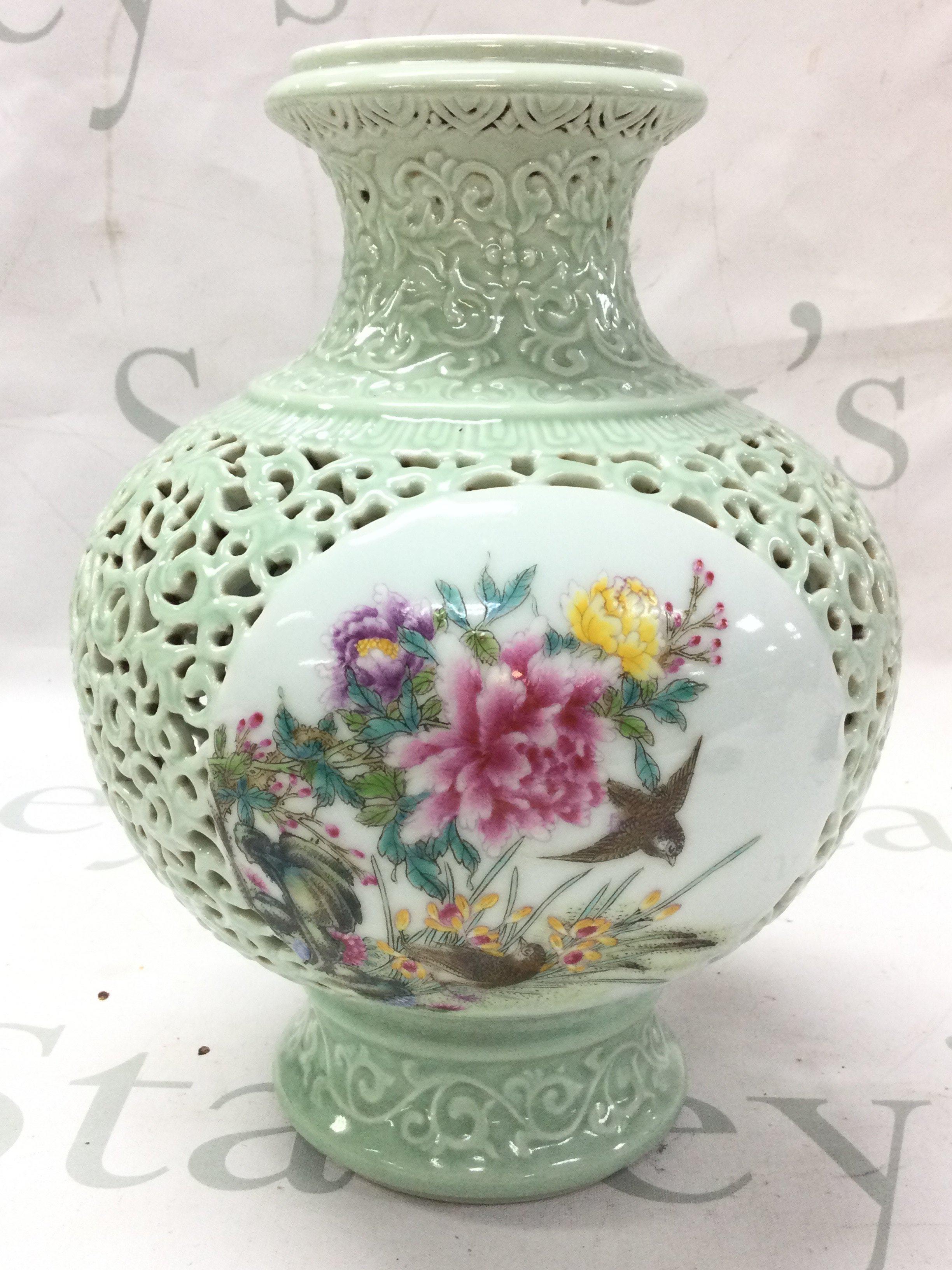 A Chinese Perforated vase , this lot cannot be posted