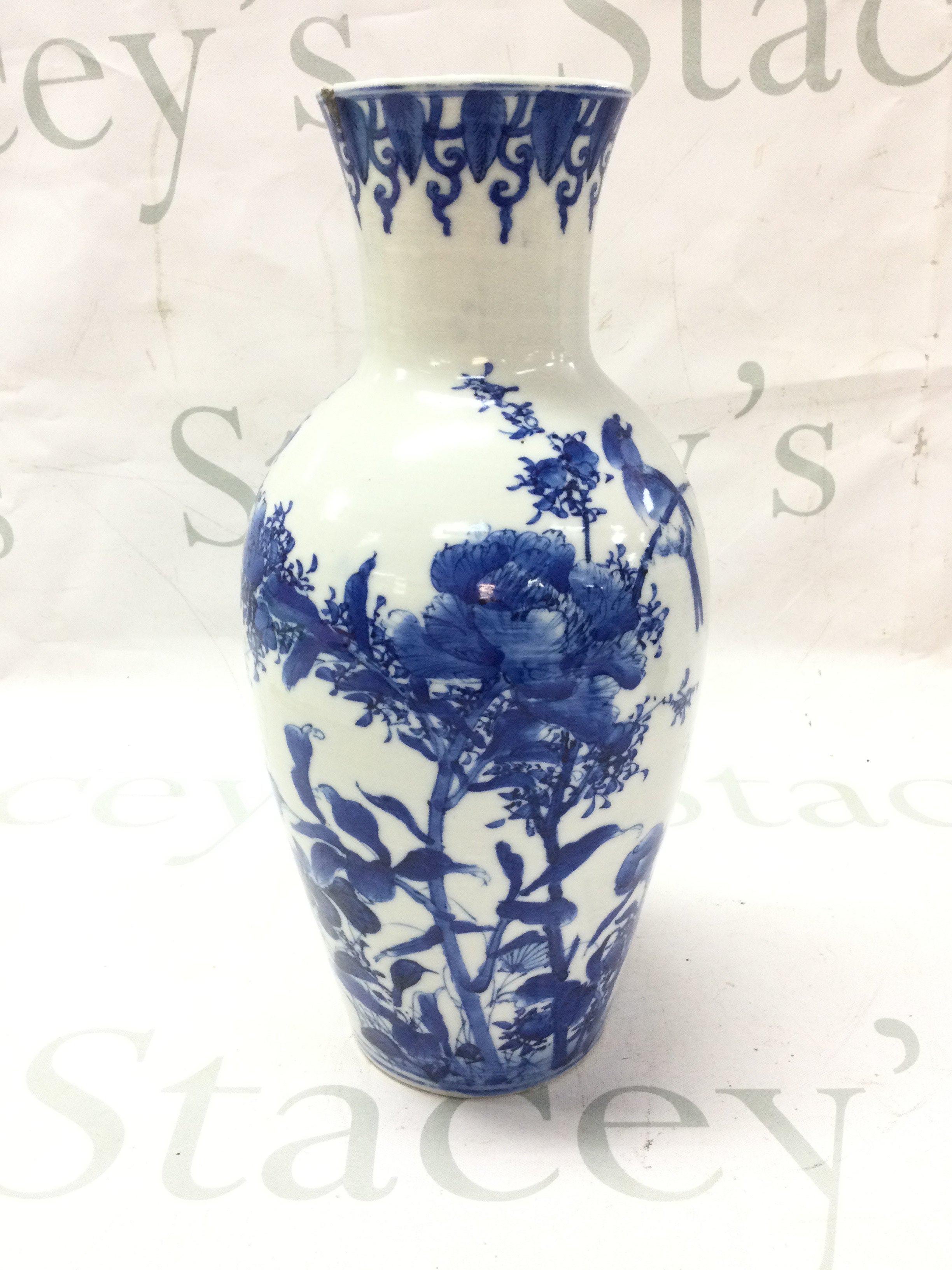 A Chinese/ Japanese signed vase . Chip as seen at top of vase. 25cm tall. This lot cannot be posted