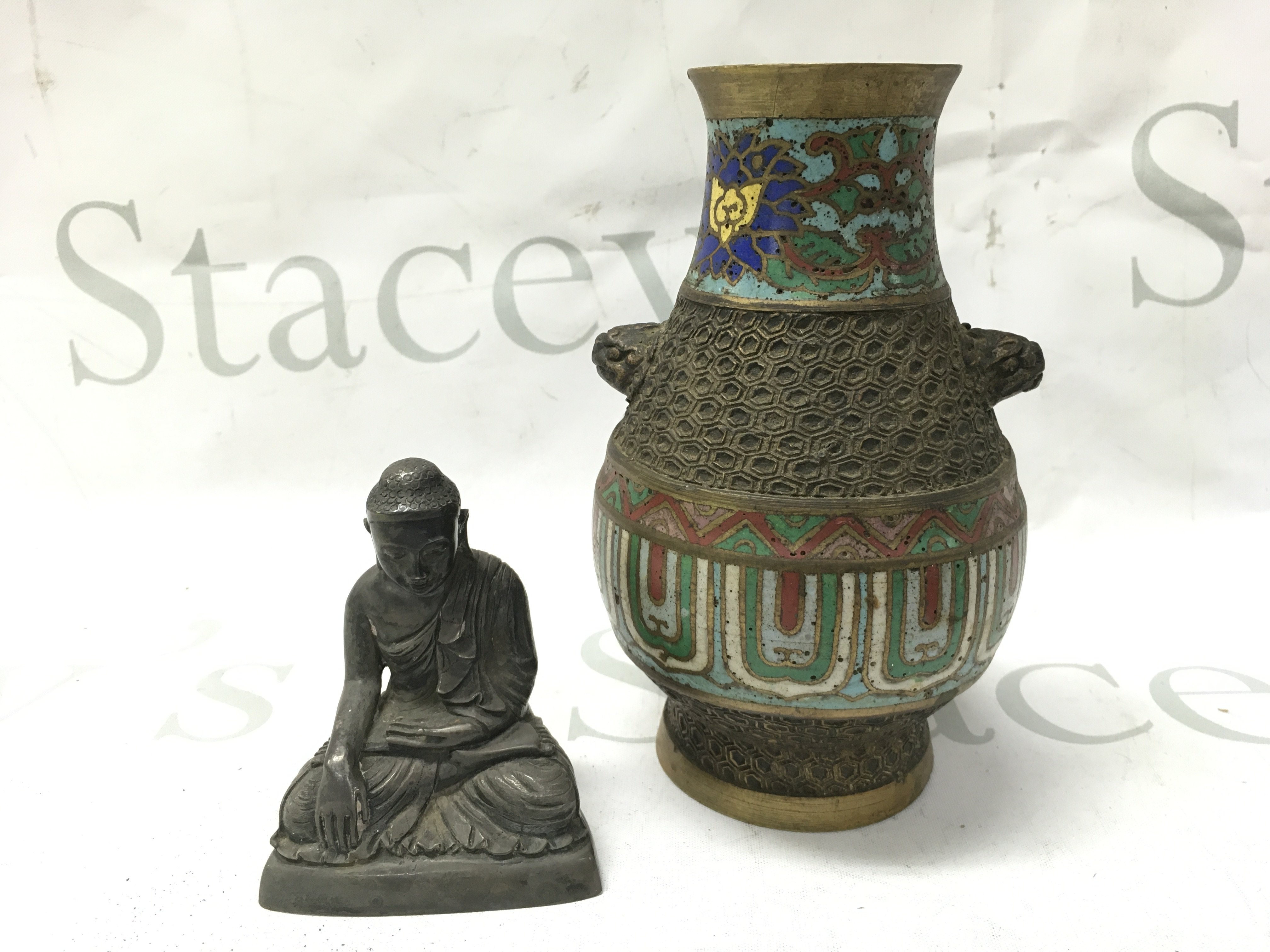A Japanese bronze enamelled vase (15cm tall) and a seated Buddha figure (8cm tall) . Postage cat b